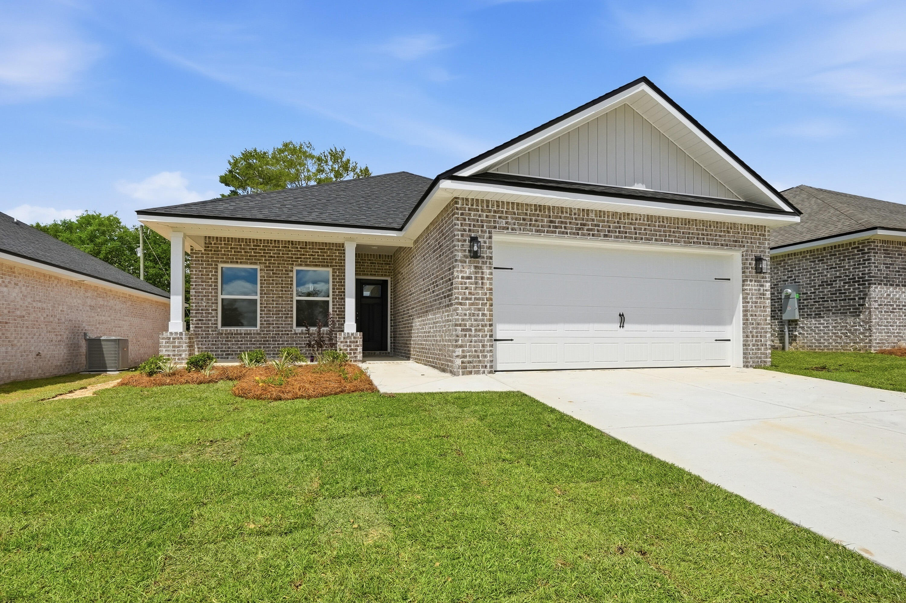 WHO COULDN'T REALLY USE A 4TH BR WHEN YOU REALLY THINK ABOUT IT!  All brick and located right across the street from Walton High. THIS ''GEORGIA PLAN'' IMPRESSES with recessed lighting, raised ceilings and other quality selections.  The builder also IMPRESSES with a $15,000 buyer incentive package, use however you want including all closing costs paid and/or rate buydown or add extras like fence or fridge etc.! MUST CLOSE BY AUGUST 31, 2026.  Finished garage, fully landscaped yard, front & rear porches,  quartz countertops, ceiling fans thru-out, vinyl plank flooring in common areas, carpet in bedrooms.   Call for more details.