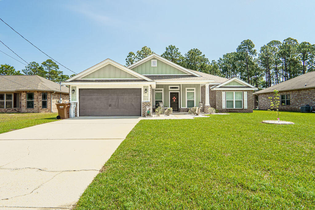 Welcome to 2036 Shannon Road, where comfort meets thoughtful design. The open-concept layout creates a welcoming flow, perfect for both relaxing evenings and gathering with friends and family. The heart of the home is the beautifully designed kitchen, complete with granite countertops, soft-close drawers, and stainless steel appliances.  Luxury vinyl plank and tile flooring run throughout the home blending style with everyday practicality. Insulated interior walls between bedrooms, bathrooms, and living spaces provide added peace and quiet, creating a more serene living experience. The primary suite offers a cozy retreat with its tray ceiling and private en-suite bathroom, featuring a new double vanity, a walk-in shower, a relaxing garden tub with tile surround, and a spacious walk in closet. Outside, you'll find an open patio and fenced backyard ideal for enjoying fresh air or weekend lounging. The backyard extends past the fence giving even more space for outdoor adventure. Two car garage with attic access adorns the front of the home. This is a great one, call for your appointment today! a relaxing garden tub with tile surround, and a spacious walk in closet. Outside, you'll find an open patio and fenced backyard ideal for enjoying fresh air or weekend lounging. The backyard extends past the fence giving even more space for outdoor adventure. Two car garage with attic access adorns the front of the home. This is a great one, call for your appointment today!