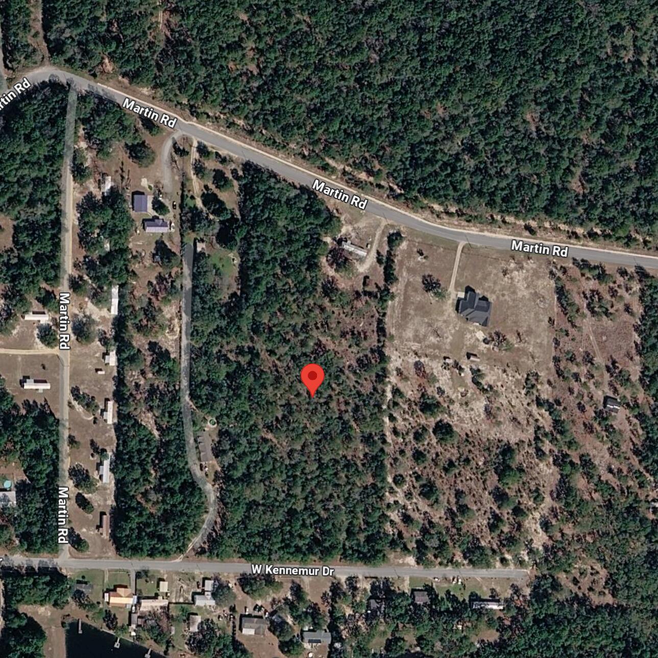 7 acres of lightly wooded land, just a quick 5-minute drive from the heart of town! This picturesque property is not only accessible via a paved road but also surrounded by nature's beauty, featuring several charming lakes and parks nearby. Enjoy the tranquility of rural living while still being less than an hour away from stunning beaches. You have been wanting this for a long time and now it can be yours. This is your dream come true!