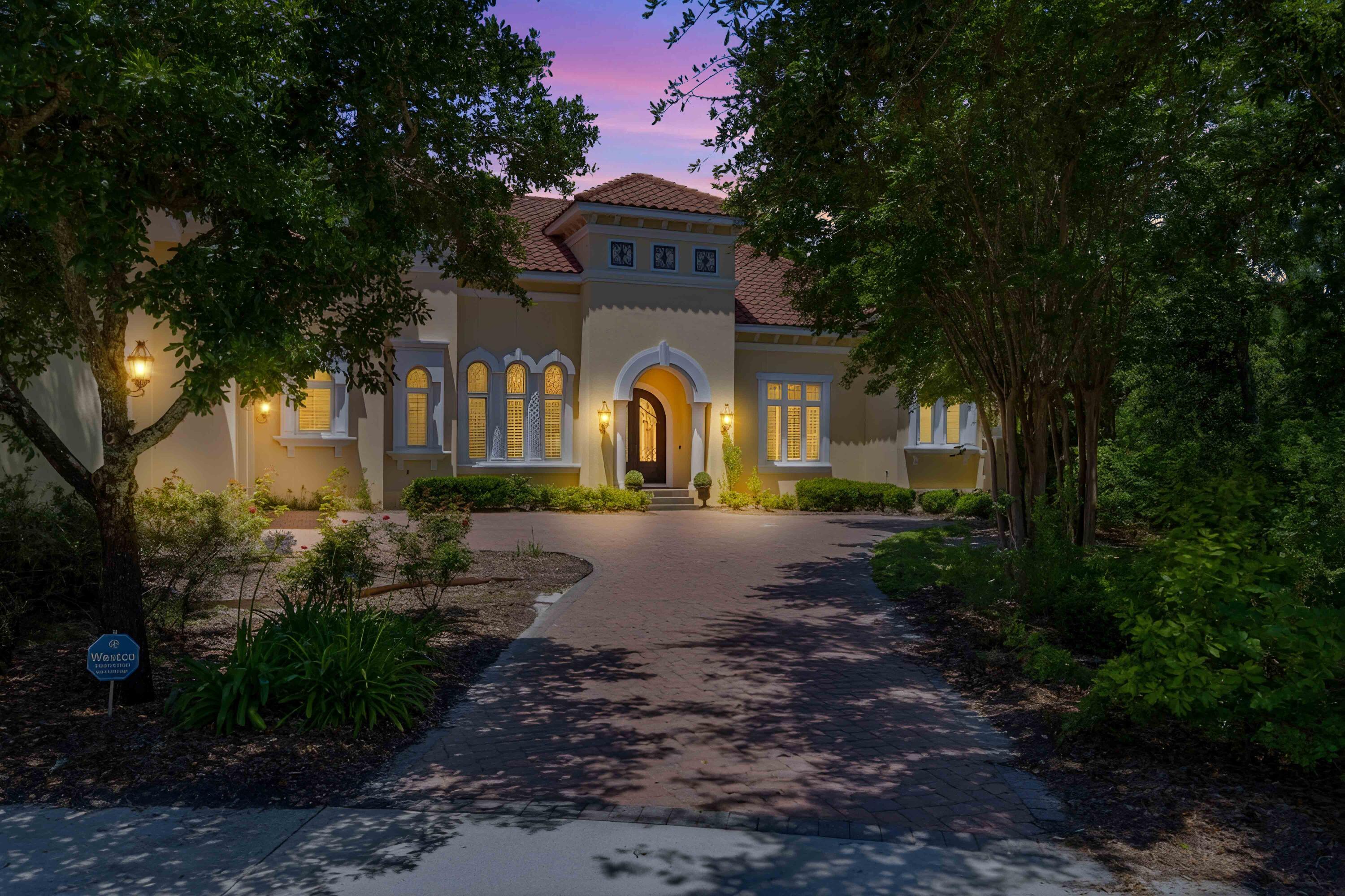 Discover luxury living on nearly a full acre lot at the end of a quiet cul-de-sac in the gated Kelly Plantation. This 5,410 sq ft custom estate offers 4 bedrooms and 4.5 bathrooms with soaring high ceilings, elegant Venetian plaster walls in the foyer, dining room, and living areas, plus custom crown molding throughout. A grand Cantera front door and a sparkling Schonbek chandelier add timeless sophistication. Enjoy a large screened-in back patio with a private swimming pool overlooking the expansive, private lot. Perfect for relaxing and entertaining in a resort-style setting. This exceptional home blends luxury finishes with coastal elegance in one of Destin's most prestigious communities.