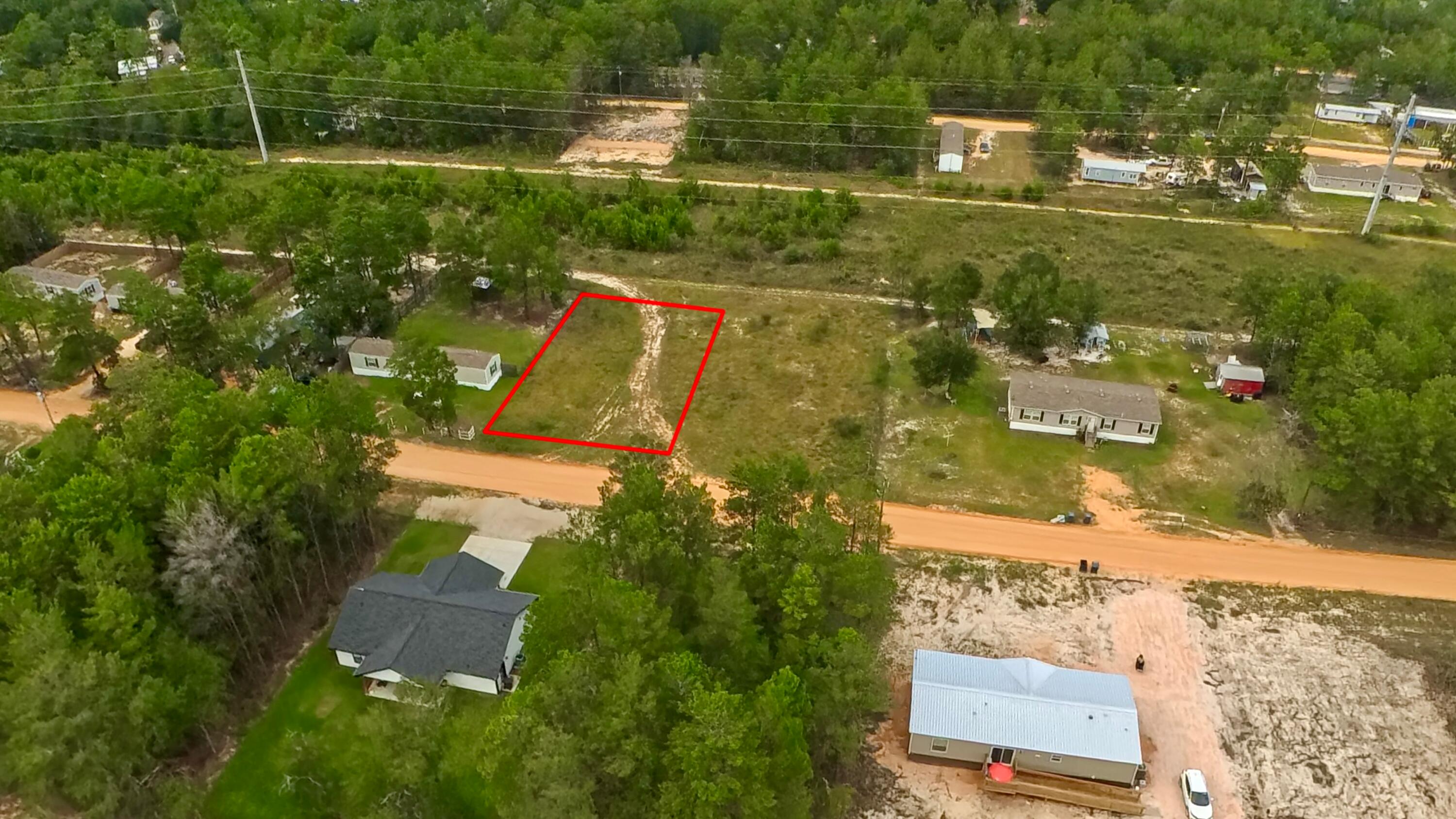 Located between DeFuniak Springs and Mossy Head with easy access to the interstate this lot have tons of protentional! If you are looking for an investment to build spec home on or to put in new mobile homes to sell, what more could you ask for than a completely cleared lot with Mossy Head water available along with power on the street. This property also offers you your own personal homestead at an amazing price. Additional lot available