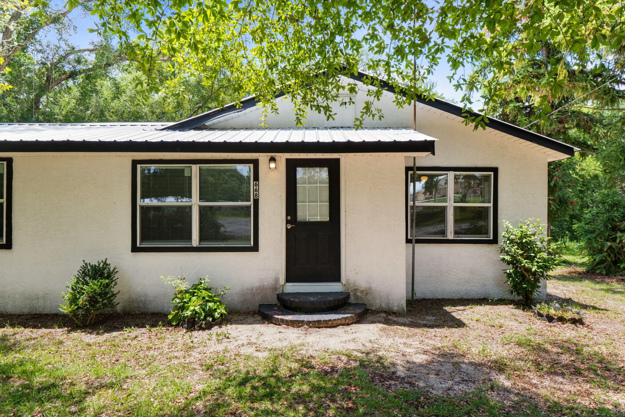 Priced to sell!! This cute home has some nice updates with an open floor plan and functional layout. It offers an opportunity for buyers to renovate or customize to their own preferences but still move in ready! Updates include a new metal roof, new windows, paint, flooring, light fixtures, and ceiling fans. The water heater is approximately 1 year old.