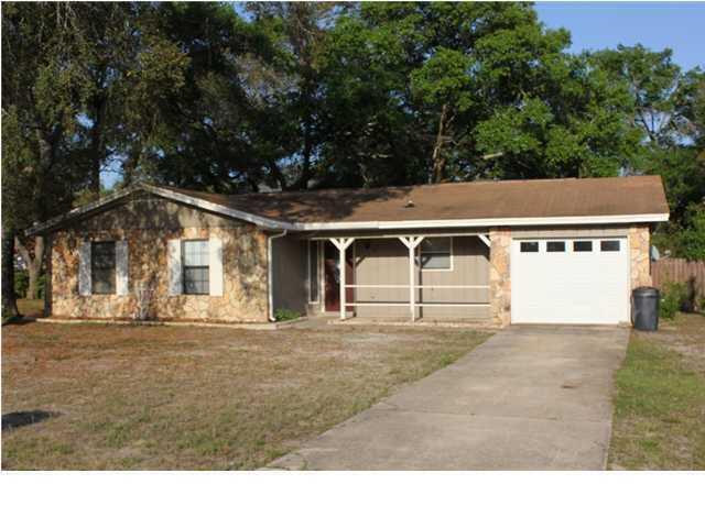 AVAILABLE 07/06/2026-This 3 bedroom, 2 bath home features a large living room with cathedral ceiling and wood burning fireplace. The master bedroom has a walk-in closet and faces the privacy fenced back yard. The back yard space is excellent for entertaining with a large concrete patio area off of the living room. There are washer and dryer connections in the one car garage. Pets may be allowed with approval and $400 non-refundable pet fee.
