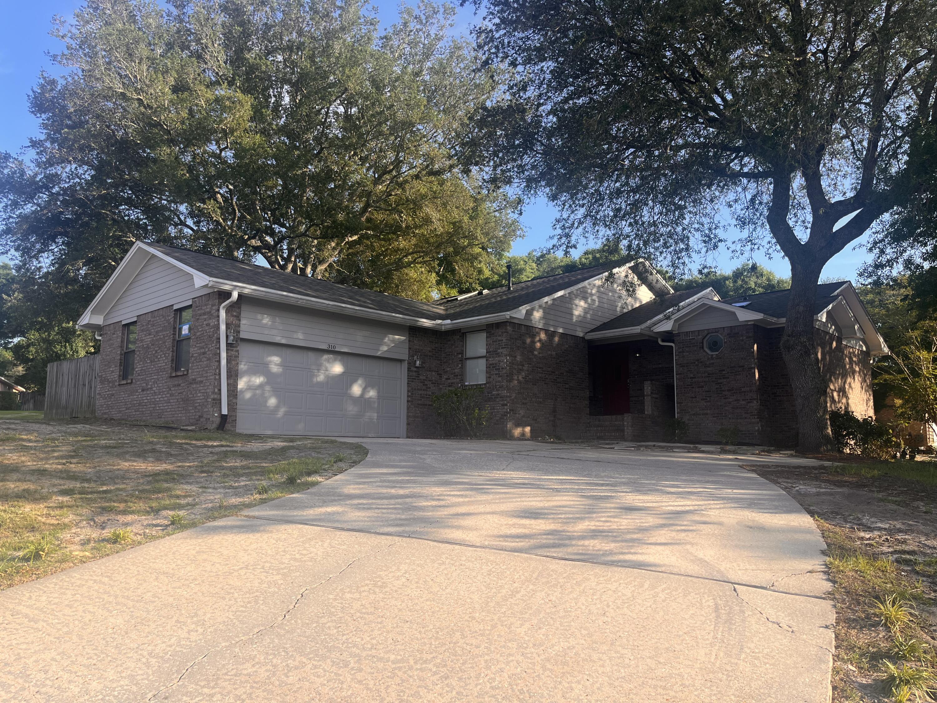Available now! Well-maintained 3-bedroom, 2-bath home located in the heart of Niceville featuring a two-car garage, oversized driveway, and a large fenced backyard situated on a corner lot within a cul-de-sac.

Offering over 1,600 square feet of living space, the home features an open floor plan with split bedrooms, providing both functionality and privacy. Recent updates include fresh interior paint throughout, new luxury vinyl plank flooring, and an inviting brick paver patio perfect for enjoying the outdoor space.

Conveniently located near Plew Elementary, Ruckel Middle School, and Niceville High School, this home offers excellent access to local schools, shopping, dining, military bases, and all that Niceville has to offer.

Pets may be considered on a case-by-case basis with owner approval and a $500 non-refundable pet fee.