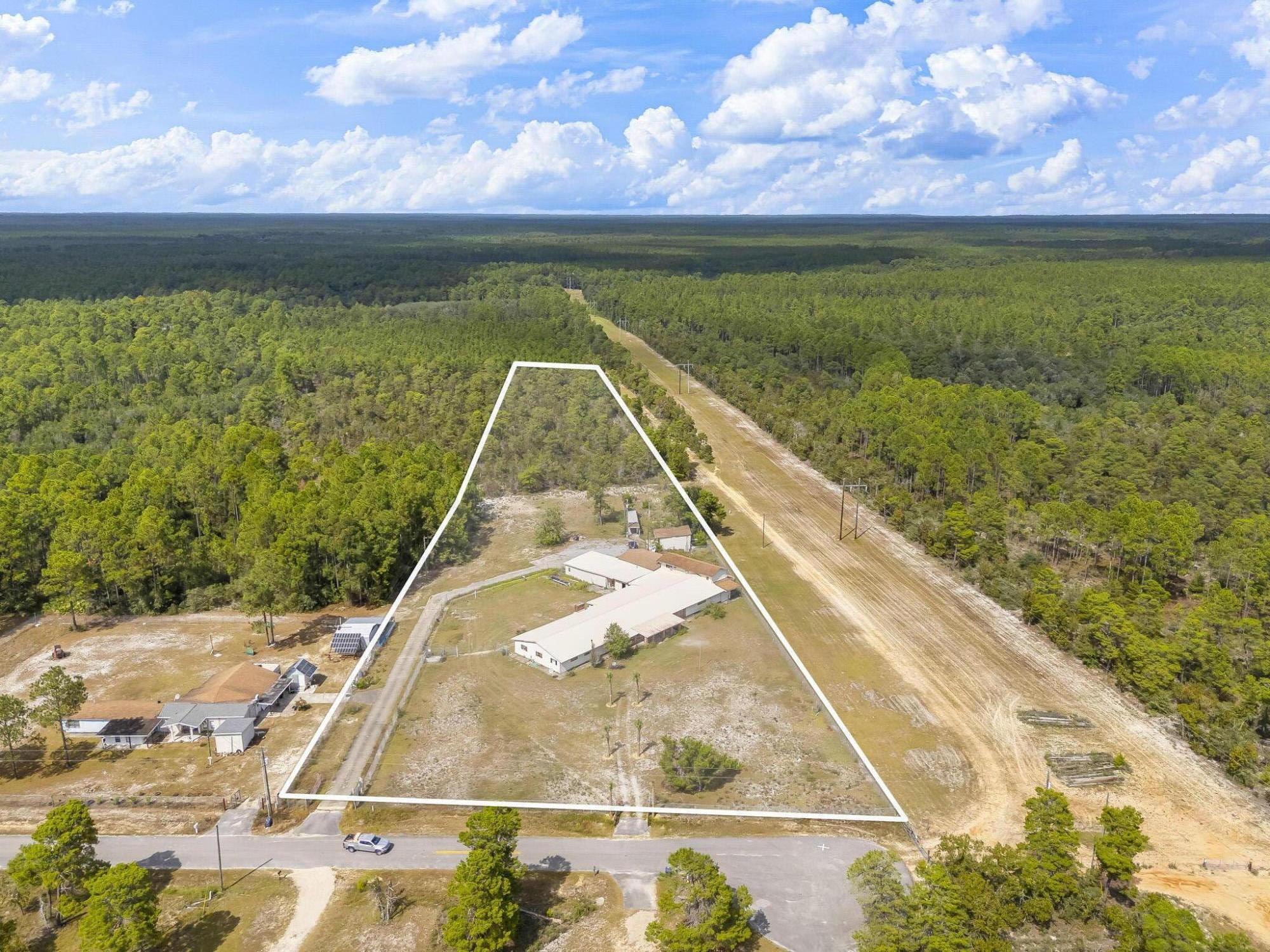 Freeport 3 acres -6200 sq feet  fixer upper
That's a steal at only 75 dollars/ft and  fixed up 150/ft minimum...
No Hoa
Shoot your gun
Shower Naked outside
Play Your Harmonica
Make a fire 
Have a goat or 100 goats
You're in the county 
You are welcome.
 This is tucked away on a quiet cul-de-sac with the rare opportunity to purchase approximately 3, 5, or up to 7 acres. This unique property offers endless potential for a private estate, multi-generational living, investment opportunity, or future renovation project.

The home is comfortable and needs details and updating,,, customization. Approximately 5,500 sq ft of the main living area is serviced by central heat and air and features a spacious floor plan ideal for a large or extended family. An additional upstairs mother-in-law suite includes a private entrance and its own private library, creating excellent flexibility for guests, rental income, or independent living arrangements.

A golf course community 1/2 mile south . Despite the growth nearby, this property maintains the privacy and freedom of county living no HOA

Bring your vision and make this hidden gem your own. Properties with this much land, square footage, flexibility, and future potential are increasingly hard to find. Property is occupied and shown by appointment only. Seller is related to the listing agent