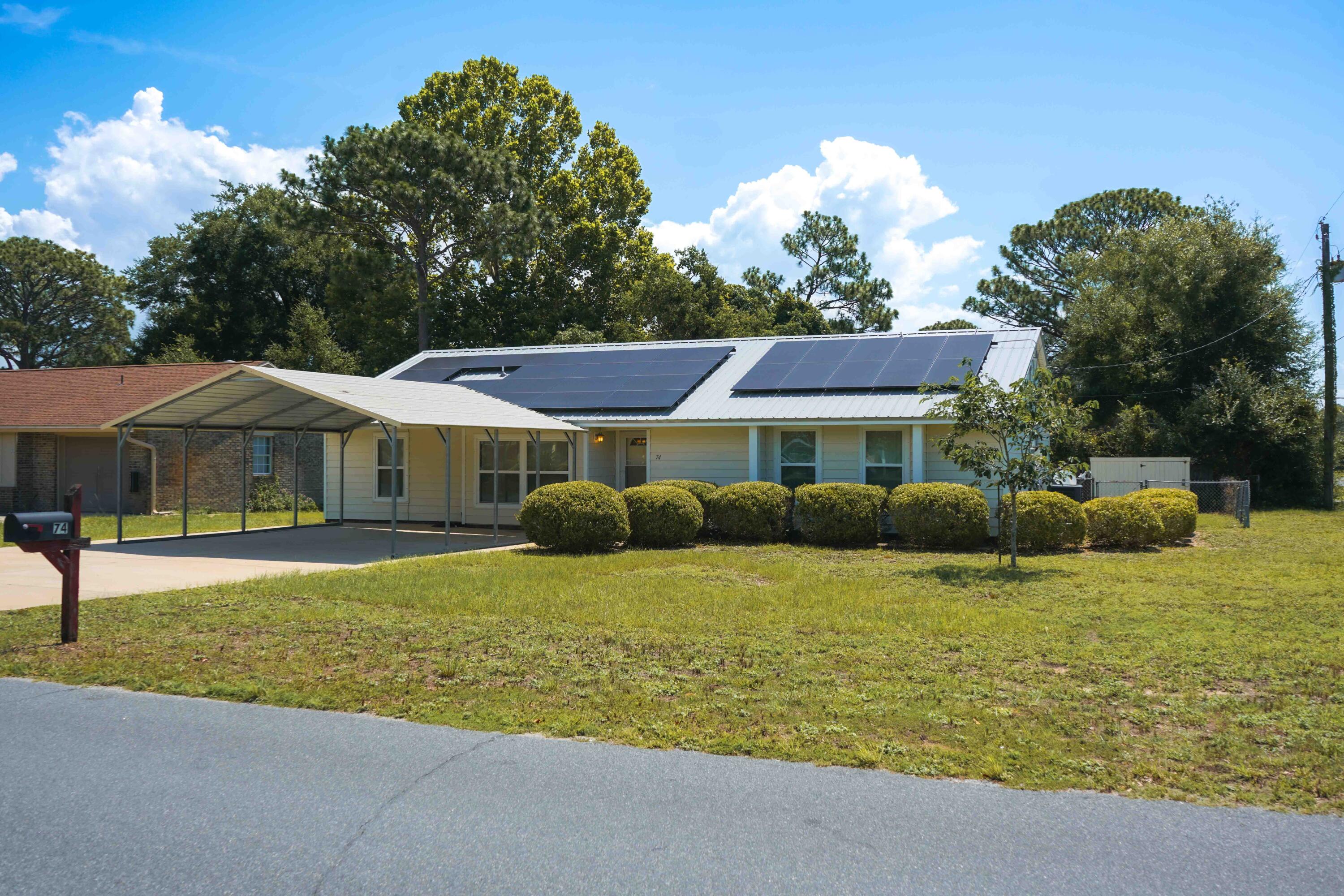**FRESHLY RENOVATED/JUNE 2026** 
This move-in-ready home features fresh interior paint and renovations, creating a bright, modern feel throughout. The thoughtfully designed layout offers the perfect balance of open living spaces and comfortable private areas, including a spacious bonus room that can be used as a home office, gym, or play room! This rare corner lot features a large back yard--ideal for growing families, entertaining guests, or simply enjoying everyday life!

This property also offers a rare combination of comfort, efficiency, and long-term value. A solar system is already in place to help offset rising energy costs.

Natural light fills the main living areas, and the seamless flow leads directly to a large back patio and expansive backyard--perfect for family gatherings, weekend barbecues, or creating your own outdoor oasis. If you're looking for a home that's been tastefully updated, offers exceptional functionality, and is located close to everything the Emerald Coast has to offer, this one deserves a spot at the top of your list. The kitchen offers a clean, functional layout with ample oak cabinetry and newer appliances (2021), leaving room for your personal touch and future upgrades to truly make it your own.

A versatile bonus room provides flexibility for a home office, playroom, or additional living space, while the oversized laundry/utility room adds convenience and extra storage.

Major systems have already been addressed, including a metal roof, HVAC, water heater, and appliances--all approximately 4 years old--giving buyers confidence and peace of mind.

Step outside to enjoy two storage buildings, partial privacy fencing, and plenty of space to add a pool, garden, or outdoor living area tailored to your lifestyle.

If you're looking for a property with strong fundamentals, valuable upgrades, and room to add your own style--all in a prime location--this is one you don't want to miss.