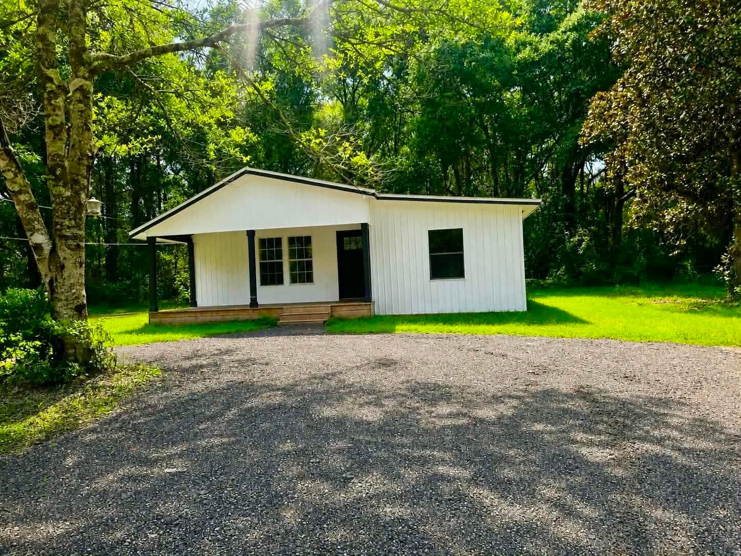 ***seller offering $5,000.00 any way money with acceptable offer***

Welcome to this beautifully renovated 3-bedroom, 2-bath home nestled on 2.05 peaceful acres in Baker. Remodeling completed in 2025, this charming home offers the perfect combination of modern updates and country living.

Nearly every major component has been replaced, giving you the peace of mind of a like-new home. Renovations completed in 2025 include a new roof, new vinyl siding, HVAC system, water heater, electrical panel, new front porch, completely remodeled kitchen, both fully renovated bathrooms, new flooring throughout, fresh interior paint, updated trim work, modern lighting, fixtures, and finishes.

The thoughtfully designed interior is bright, fresh, and welcoming, offering an open, updated feel that's ready for you to move right in. Outside, you'll enjoy 2.05 acres of beautiful property with plenty of room for a garden, workshop, recreational vehicles, animals, or simply relaxing and enjoying the peaceful surroundings.

If you've been searching for a move-in-ready home with acreage where all the major updates have already been completed, this is the one you've been waiting for!