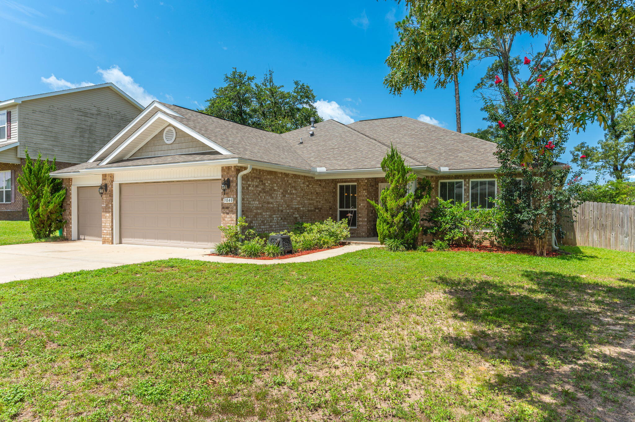 This 4/3 offers a three car garage PLUS office and bonus room, and is one you are going to want to come see! Step inside to an inviting open-concept floor plan where the living room flows seamlessly into the kitchen, creating an ideal space for everyday living and entertaining. The kitchen is equipped with stainless steel appliances, granite countertops, a pantry, and plenty of prep space. Enjoy meals in the formal dining room for special occasions or the cozy breakfast nook for casual mornings. Just off the living room, you'll find a versatile bonus space that can easily serve as a home office, playroom, media room, or hobby area to fit your lifestyle. The spacious primary suite is a true retreat, featuring a double vanity, walk-in tiled shower, relaxing soaking tub, and a private water closet. The additional bedrooms are all also generously sized. Step outside to enjoy the fully fenced backyard, complete with a covered patio perfect for relaxing or entertaining. A separately fenced play area offers added peace of mind. 
With its thoughtful layout, quality finishes, and fantastic outdoor space, this home is ready to welcome its next owners. Schedule your private showing today! Some photos have been digitally staged.