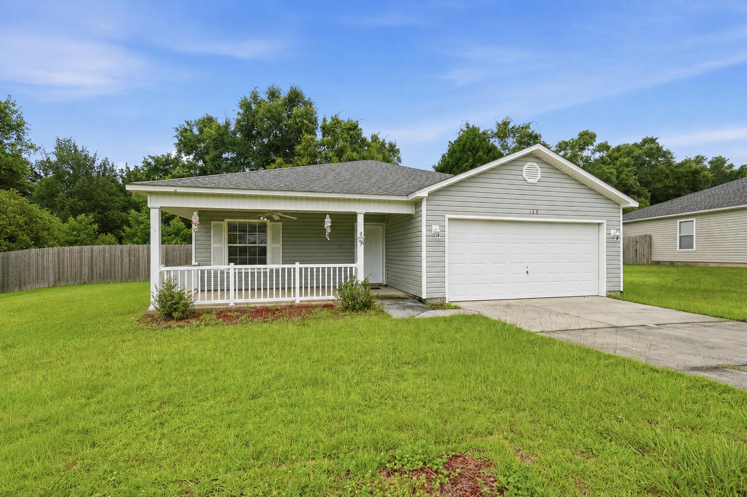 Welcome to this charming home in the  Ridgecrest Estates community, where Southern charm meets comfortable affordable living. A welcoming front porch creates the perfect spot to relax and enjoy your morning coffee or unwind at the end of the day.

Inside, you'll find a thoughtfully designed split-bedroom floor plan featuring 3 bedrooms and 2 bathrooms. Cathedral ceilings enhance the spacious living area, creating an open and airy atmosphere that's ideal for both everyday living and entertaining. Durable laminate flooring, offering a stylish, low-maintenance finish with no carpet.

Step outside to a spacious back deck overlooking the fully fenced backyard--perfect for outdoor entertaining, family gatherings, grilling, or providing a safe space to play.

For added peace of mind, the roof was replaced in 2021, making this move-in-ready home an excellent opportunity for its next owner. Don't miss your chance to own this beautiful home in the sought-after Ridgecrest Estates community!  HVAC is 2019 and water heater is 2016.