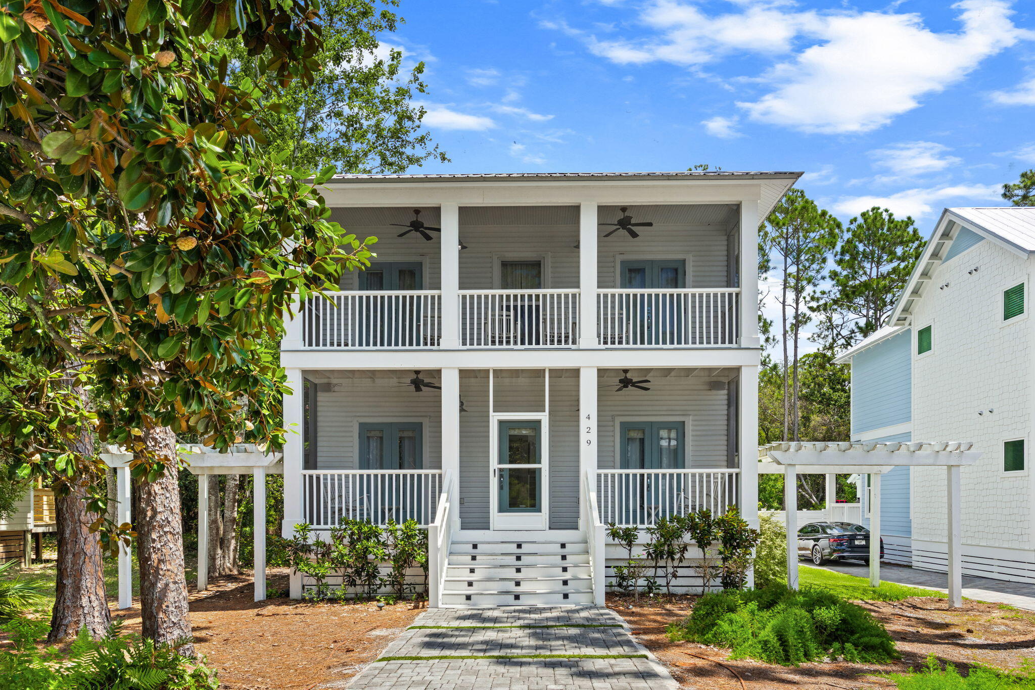 Welcome to your Seagrove Beach escape! Tucked behind lush landscaping on a quiet street in the heart of 30A, this beautifully appointed 4-bedroom, 3-bath beach house offers the perfect blend of coastal comfort and investment potential, with approximately $100K in recent upgrades, including enhancements to the primary suite, new flooring, pool pump, and more. The bright, open floor plan is designed for effortless entertaining, while the upgraded kitchen features quartz countertops, an integrated waterfall-edge island, and stainless-steel appliances. At the front of the home, a spacious screened-in lanai creates a welcoming spot to relax and enjoy the coastal breeze. Step into the private backyard oasis featuring a heated gunite pool, sun deck, and grilling area--perfect for cooling off and entertaining after a day at the beach. The spacious primary suite offers tall ceilings, coastal accents, a comfortable sitting area, and access to a screened balcony where you can unwind and enjoy the evening breeze. Located in sought-after Seagrove Beach, this property puts you close to the sugar-white beaches, emerald waters, 30A's acclaimed restaurants, boutique shopping, and outdoor adventures. Already generating approximately $85K in rental income in the first half of 2026, with roughly $175K projected for the year. Whether you're searching for a personal beach retreat, second home, or vacation rental investment, this exceptional coastal cottage is ready to welcome you home!
