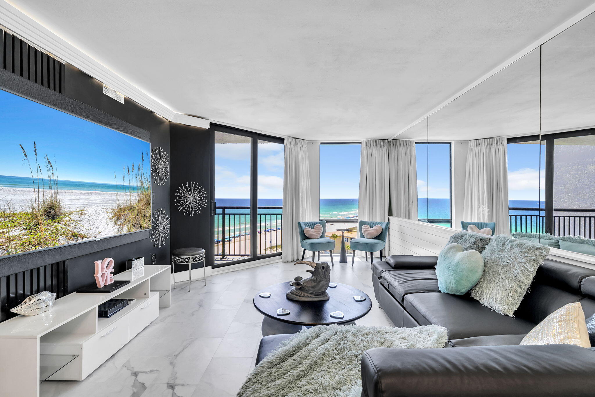 Positioned in the heart of Destin and overlooking the Gulf's ever-changing shades of blue, this beautifully finished condo offers the kind of setting that keeps owners and guests returning year after year. From your private balcony, enjoy uninterrupted views of the emerald coastline and spectacular sunsets, all while being just steps from the beach and within walking distance to some of Destin's most popular restaurants, shops, and attractions.

What truly makes this condo special are the thoughtful custom details that elevate it beyond the typical beach condo. Carefully designed built-ins and coastal-inspired finishes add warmth, character, and functionality, creating a space that feels more like a private retreat than a vacation rental. Offered fully furnished and turn-key, it's ready to be enjoyed from day one. SunDestin Beach Resort has recently completed extensive building-wide improvements, including new impact-rated windows and sliding doors, exterior waterproofing and paint, renovated balconies and railings, upgraded common areas, and a new beach boardwalk. Even better, all special assessments will be paid in full by the seller at closing, allowing the next owner to enjoy the benefits without the expense.

Owners and guests enjoy over 100 feet of private deeded beachfront along with a collection of resort-style amenities including a renovated pool, hot tub, splash pad, fitness center, sauna, steam room, on-site restaurant, tiki bar, seasonal beach service, and on-site security. HOA dues cover electricity, water, cable, internet, trash, insurance, grounds maintenance, and recreational amenities, making ownership refreshingly simple.

Whether you're searching for a vacation home, an investment property, or both, few locations rival the convenience and appeal of being able to leave the car behind and stroll to dining, entertainment, and family attractions while having the Gulf right outside your door.