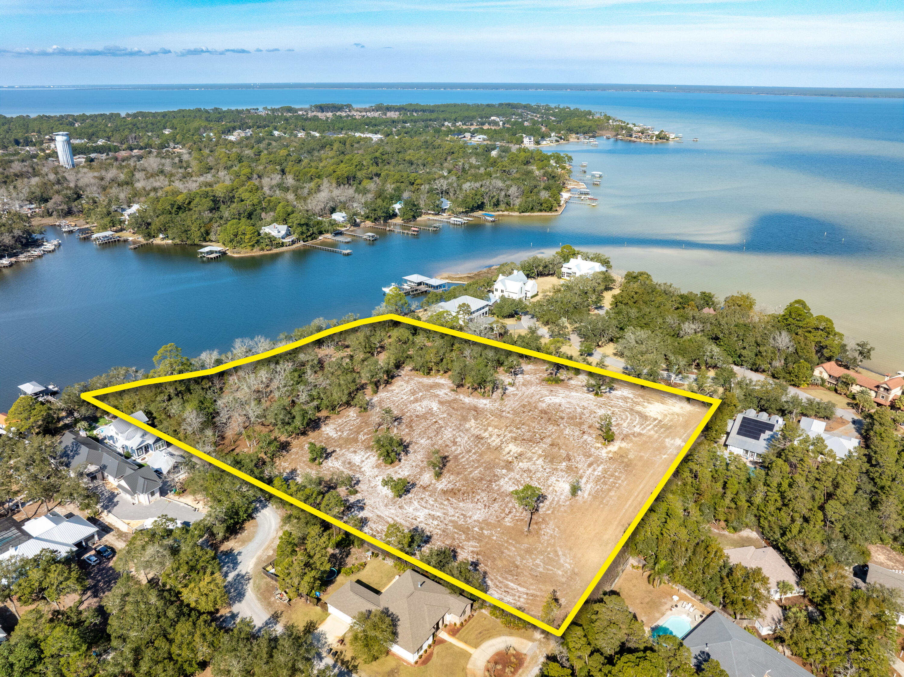 Incredibly rare assemblage of three contiguous lots on deep-water Mack Bayou in Santa Rosa Beach, Florida.
This phenomenal expanse of approximately 5.73 prime acres and 443' of shoreline offers a stunning view corridor across the broad bayou to the Choctawhatchee Bay in South Walton County. 
The assemblage is zoned Neighborhood Infill by the F.L.U.M. and would be an ideal trophy property on which to build a generational family compound.  Please inquire for further details.