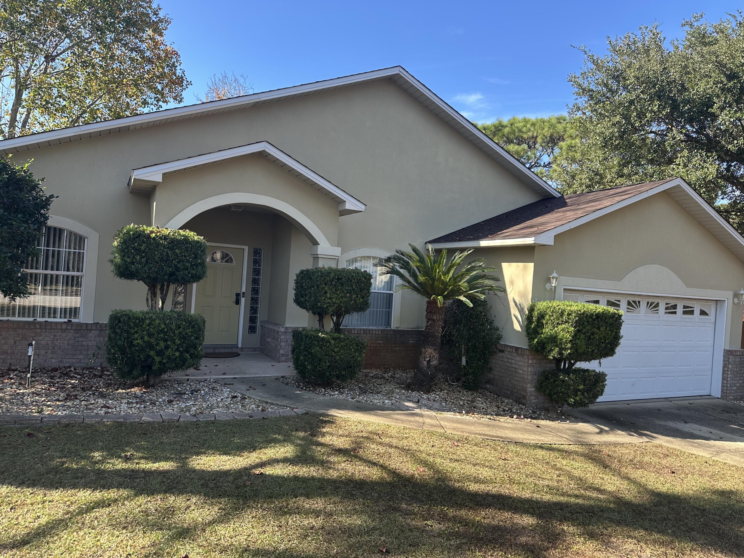 Well located at the front of the Holley By The Sea community.  This 4/2 has a new roof installed in 2025. Recently added also is a large (12' X 33') screened Florida room complete with ceiling fans with lights.  It is accessible both from the living room and the master bedroom. The kitchen has been upgraded. All counter tops are top quality granite, appliances steel. Exceptionally well done tile floors throughout. Master bath recently upgraded walk in  shower.  Handicap accessories have been added to both baths.