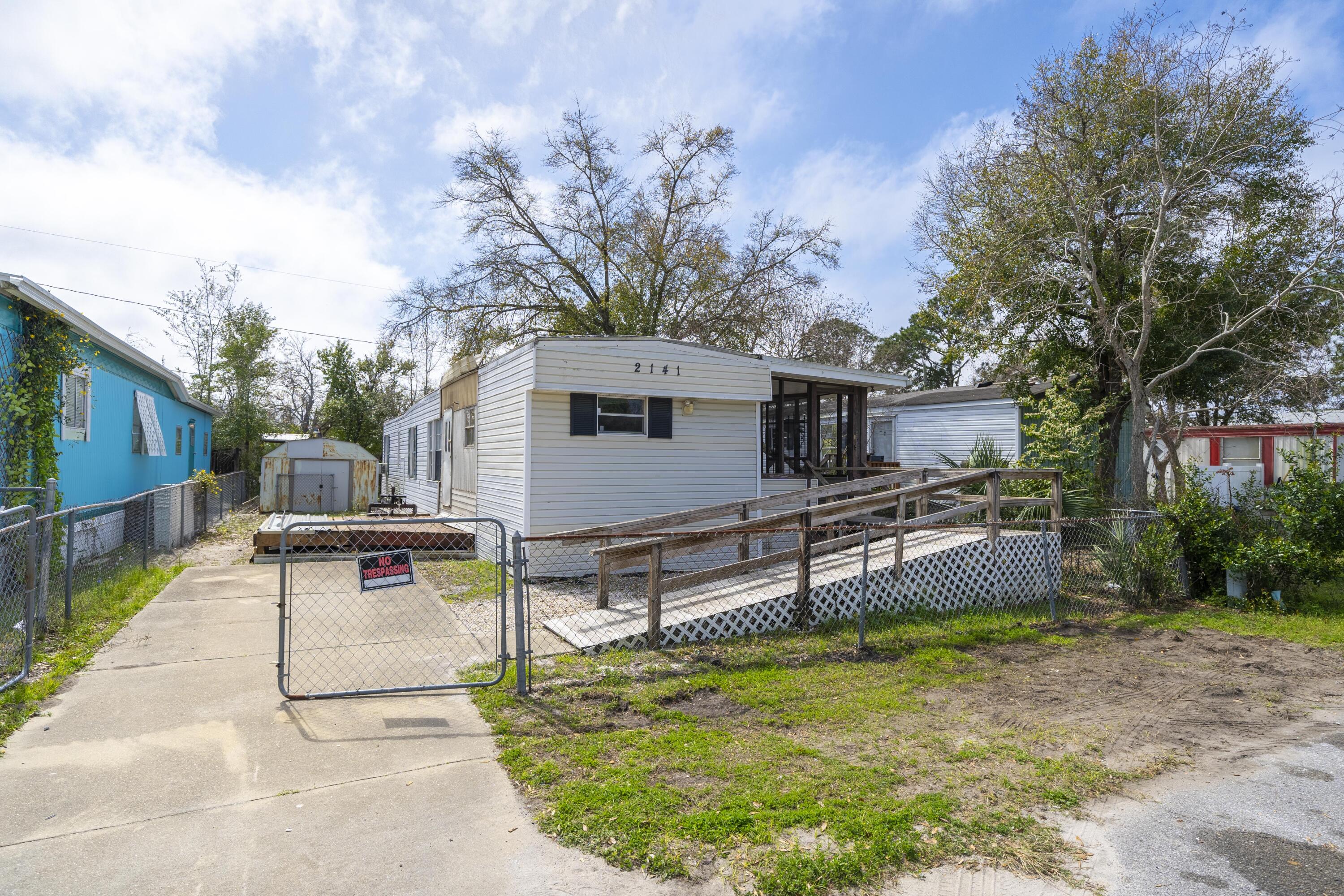 2 bedroom, 1 bath single-wide mobile home located in the center of town just off Frankford Avenue between Kings Point and SweetBay. This location puts you close to everyday conveniences with quick access to grocery stores, shopping, schools, and medical facilities throughout Panama City. Just minutes from downtown Panama City and a short drive across the Hathaway Bridge to Panama City Beach, making it easy to enjoy both the bay and the beach. This property could make a practical option for someone looking for affordable housing, a rental investment, or a simple place to live without being far from town. Convenient location and easy access to major roads, center of PC.