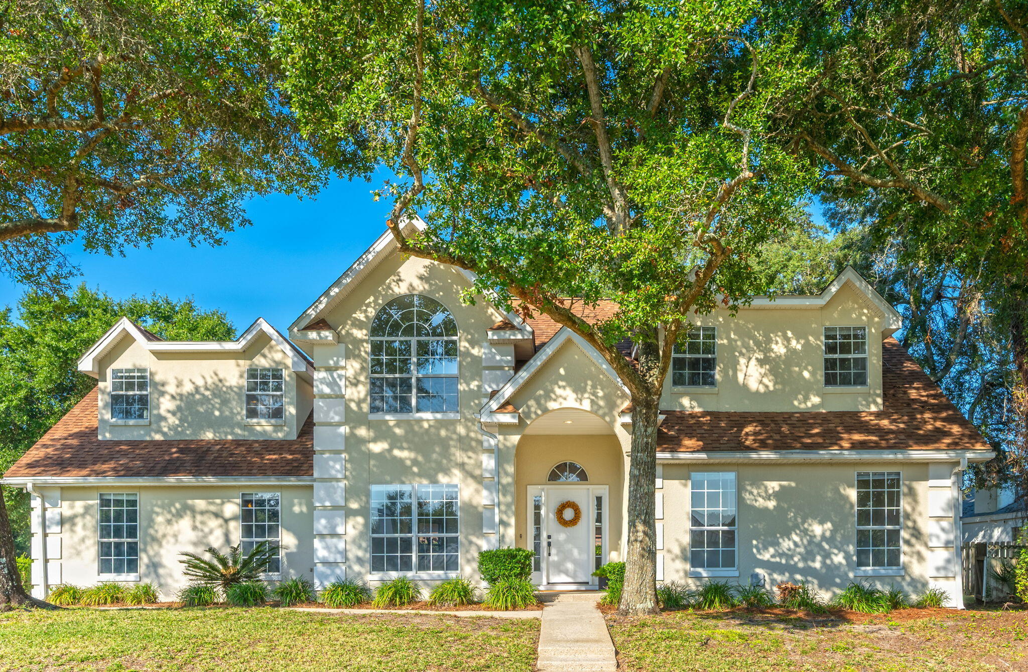 72 Hour Kick Out Clause in Place. Under contract contingent on the sale of buyers home. Perfectly positioned on a high corner lot, this 2,663 square foot, 4 bedroom + office/bonus space, 3 bath brick home offers coastal charm, modern updates, and gorgeous glimpses of Choctawhatchee Bay. From the moment you arrive, the elevated setting and bay breezes set the stage for a lifestyle filled with comfort, connection, and relaxation.

Step inside through the welcoming foyer with soaring ceilings, leading into a spacious living room flooded with natural light. Here, high vaulted ceilings, recessed lighting, a wet bar, and a cozy fireplace create the perfect backdrop for entertaining or quiet evenings at home.

 The large kitchen has been beautifully refreshed with painted cabinets, new light fixtures, and ample cabinet space. A breakfast bar, bright breakfast nook, built-in desk, and a separate dining area make this space both functional and invitingideal for everyday living and hosting family gatherings.

The first-floor primary suite is a retreat of its own, featuring a spacious ensuite with a garden whirlpool tub, dual sinks, his-and-hers closets, a private water closet, and a walk-in shower. Upstairs, three additional bedrooms all enjoy water views and share a well-appointed bathroom with a double vanity and brand-new faucets.

Throughout the home, you'll find new luxury vinyl plank flooring in the main living areas, plush new carpet in the bedrooms, and fresh paint throughout, making this home completely move-in ready. The two-car garage opens into a laundry and mudroom with an additional space perfect for storage, a hobby room, or even a small office.

Outdoors, you're just steps from the water, where you can soak in stunning sunsets and refreshing breezes. Take a golf cart or bike ride to Meigs Beach for fishing, boating, and beachside fun. For recreation, Shalimar Country Club and Shalimar Pointe Golf Club are just minutes away, offering tennis, golf, and a welcoming social atmosphere.

Beyond the neighborhood, Shalimar offers a small-town coastal feel with bayfront parks, fishing piers, and easy access to the Gulf of Mexicoall while being just 10 miles to Eglin Air Force Base and 11 miles to Hurlburt Field.

Recent updates & highlights:
	"	New luxury vinyl plank & carpet throughout
	"	Fresh interior paint, including painted kitchen cabinets
	"	New light fixtures in dining & kitchen nook
	"	New faucets in upstairs bath
	"	New Hot water heater 
	"	Two Newer HVAC units
	"	All copper wiring

This beautiful Shalimar home offers the best of coastal Florida livinga balance of everyday comfort, a warm and inviting atmosphere, and a backdrop of bay views perfect for entertaining or unwinding.