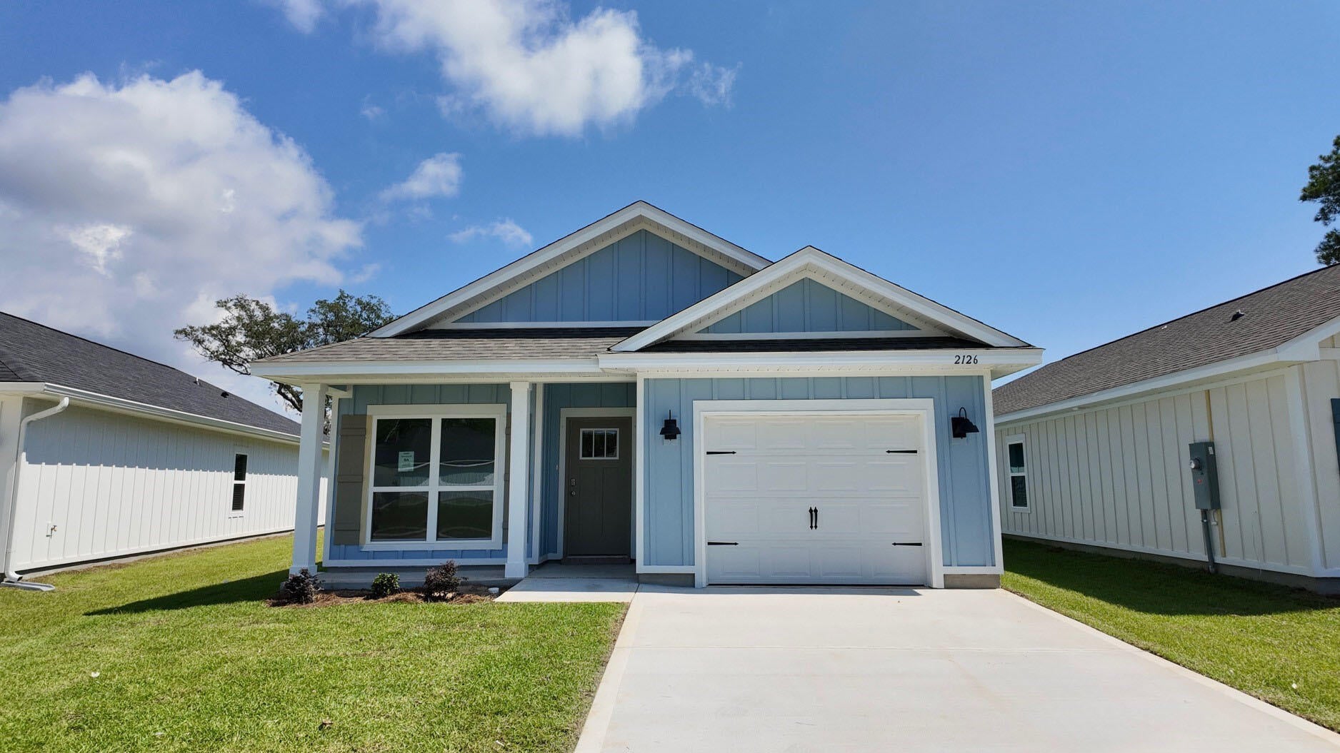 Welcome to Waterside at East Bay! Brand NEW community featuring a lovely community dock on the pond. The 'Julia' model is a highly desirable open concept floorplan, 3 bedrooms with an additional flex space, 2 bathrooms, 1-car garage, and the 'Smart Home Connect 'System with a variety of convenient Smart Home devices you will love. Open concept living room opens to the kitchen and dining room with lots of windows for natural lighting. Covered back patio off the dining area. The well-designed open kitchen includes stainless steel appliances, a smooth-top range, built-in microwave, quiet dishwasher, pantry, center island bar, eye-catching wood-look flooring, and plush carpet in the bedrooms. Quartz countertops in the kitchen and baths. 9-foot ceilings throughout. Fabric Hurricane door and window protection is also included. ALL LISTING pictures, colors, features, and size may vary. Square footages are approximate.
