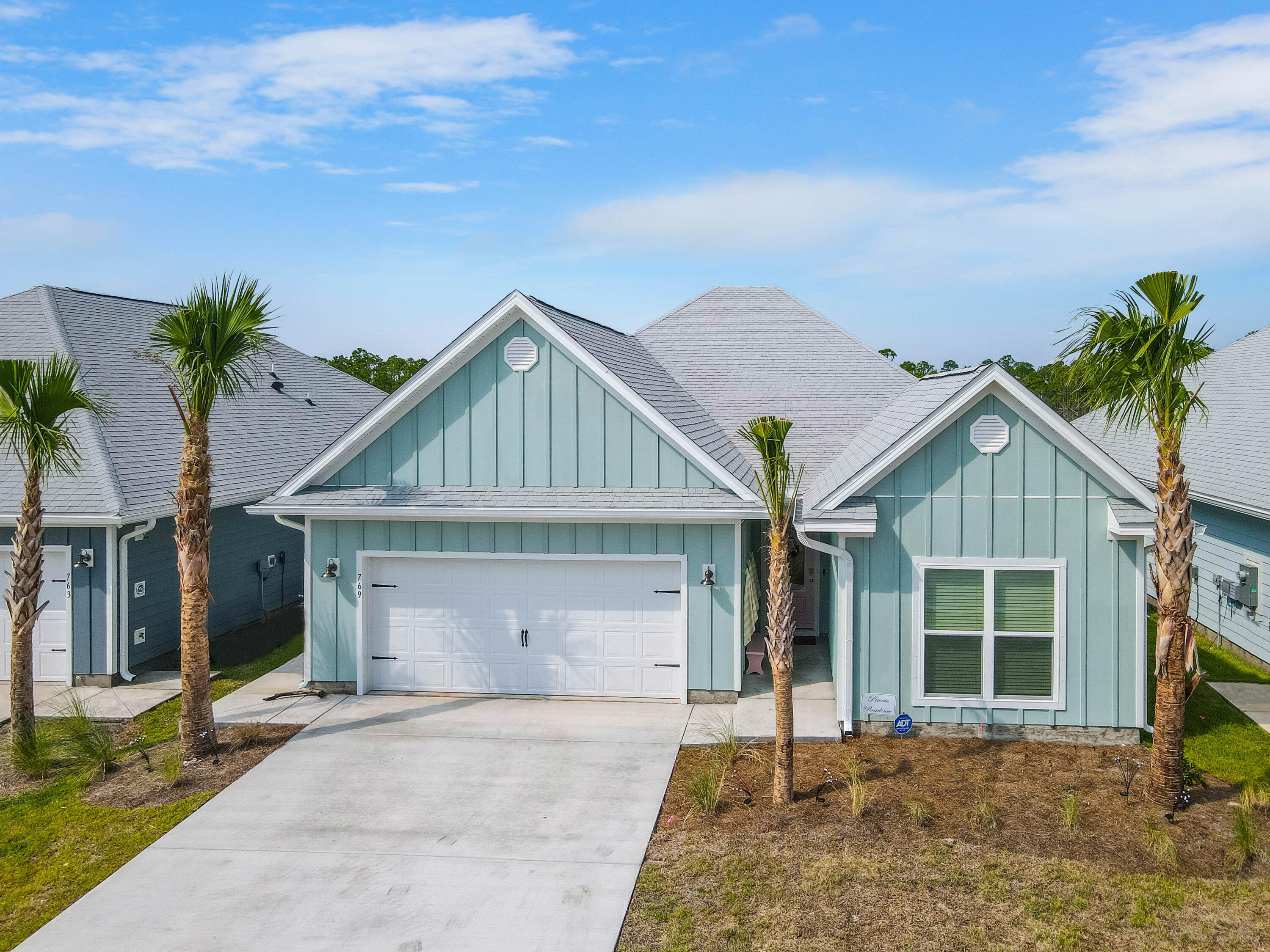 A relaxed coastal lifestyle meets thoughtful versatility in this beautifully appointed home located in the desirable Windmark Beach community of Port St. Joe. Just a short golf cart ride to the sugar-white sand and vibrant Town Center, this Kennedy floor plan offers over 2,100 square feet of comfortable coastal living with peaceful pond views and exceptional flexibility for owners and guests alike. Positioned on a tranquil homesite backing to a serene retention pond, the setting creates a quiet backyard retreat where mornings begin with calming water views and evenings invite time outdoors. Inside, the open-concept living area provides a natural gathering space, with the kitchen flowing seamlessly into the dining and living areas--perfect for entertaining or everyday coastal living. One of the home's standout features is the true in-law suite designed as a fully independent living space. With its own private entrance, kitchen, bedroom, full bathroom, and living area, the suite offers incredible flexibility for extended family, guests, or potential rental income while maintaining privacy from the main home. The primary suite offers a relaxing retreat with a soaking tub, walk-in shower, double vanity, and generous space. Two additional bedrooms complete the layout, bringing the total to four bedrooms and three bathrooms. Offered fully furnished and turnkey, the home has been owner-managed as a rental and provides the opportunity for continued income or immediate enjoyment as a personal coastal getaway. Located within the golf cart-friendly Windmark Beach community, residents enjoy scenic boardwalks, miles of walking and biking trails, a charming Town Center with dining and shops, and easy access to the beautiful beaches of the Forgotten Coast.