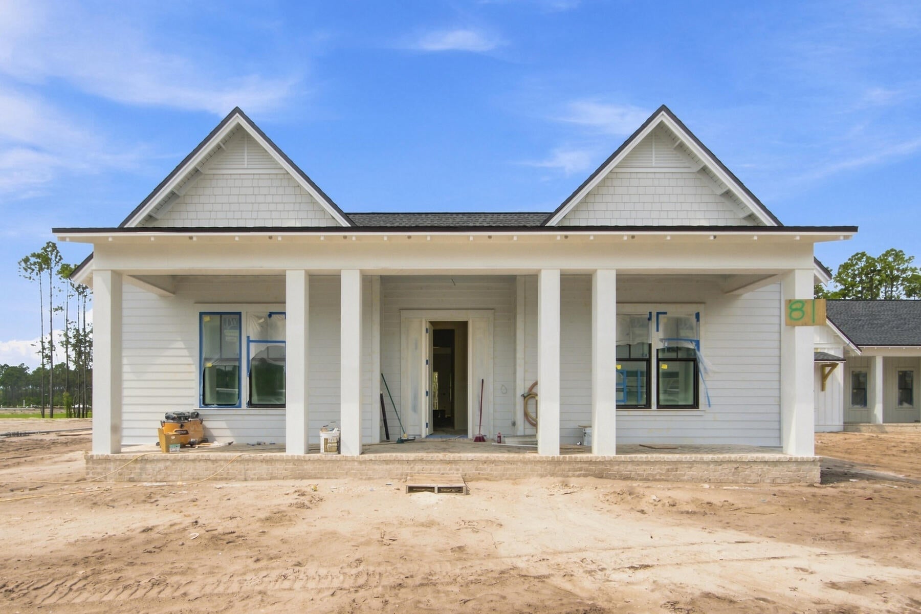 *The new price reflects a builder discount of over $110,000. 

The Ficus rear-load garage plan in the Preserve Collection at Arborview Park offers 2,685 square feet, 4 bedrooms, 4.5 bathrooms, an expanded rear-load 2.5-car garage connected to the home by a covered walkway, and a private pool and spa with an upgraded pool package. Located on a 65' x 159' homesite, the layout is designed to balance open gathering areas with separation between the primary suite and secondary bedrooms. Estimated completion is early-Sept. '26.

The foyer opens into the central living space where the kitchen, dining, and living areas connect beneath 11-foot ceilings with clear sightlines to the rear porch and pool area. A 12-foot bronze slider door extends the living space outdoors, creating a direct connection to the screened porch, saltwater pool and spa, expanded paver deck, and fenced backyard. The outdoor layout is designed to take advantage of the depth of the homesite while maintaining privacy and usable yard space.

The kitchen is positioned at the center of the home and includes a white oak island, quartz countertops, stacked glass cabinetry, custom wood hood vent, under-cabinet lighting, walk-in pantry, and an upgraded appliance package with a Wolf dual fuel range, microwave drawer, Sub-Zero refrigerator, vent hood, and Cove dishwasher. Wide-plank Medallion wood flooring continues throughout the home, complemented by crown molding, lap and gap detailing on all walls in living room and entry hallway, bronze windows, and upgraded shaker-style interior doors. 

The primary suite is privately positioned on one side of the home and includes a freestanding tub, walk-in shower with handheld fixture, custom closet built-ins, and a framed full-size mirror. Secondary bedrooms are arranged separately with direct bath access, supporting both guest accommodations and everyday functionality.

Additional features include painted wood shelving throughout closets and pantry spaces, laundry cabinetry with sink and countertop, generator prewire and gas line, pre-plumbing for water filtration, framed TV boxes, Decora switches, impact-rated windows and doors, tankless water heater, CAT6 wiring, and irrigation with landscaping package.
