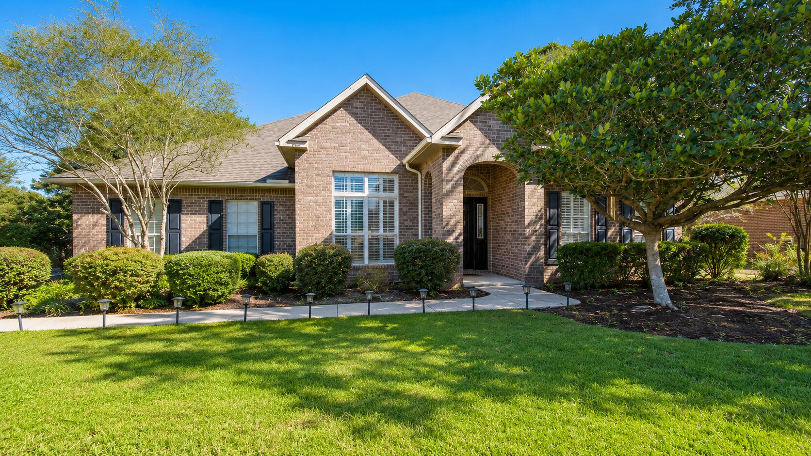 Experience luxurious pond-front living in this beautifully updated McKenzie home in Hammock Bay. Set on an expansive 0.6-acre lot, this exceptional residence offers 5 spacious bedrooms, a private office, 3 full baths, formal and casual dining, and a chef-inspired kitchen with abundant storage. New flooring and fresh paint create a bright, refined interior, while the living area flows into a four-season room and multi-level deck overlooking the peaceful pond. A fenced backyard, scenic nature trails and generous indoor-outdoor living make this the perfect place to call home in Freeport, Florida.