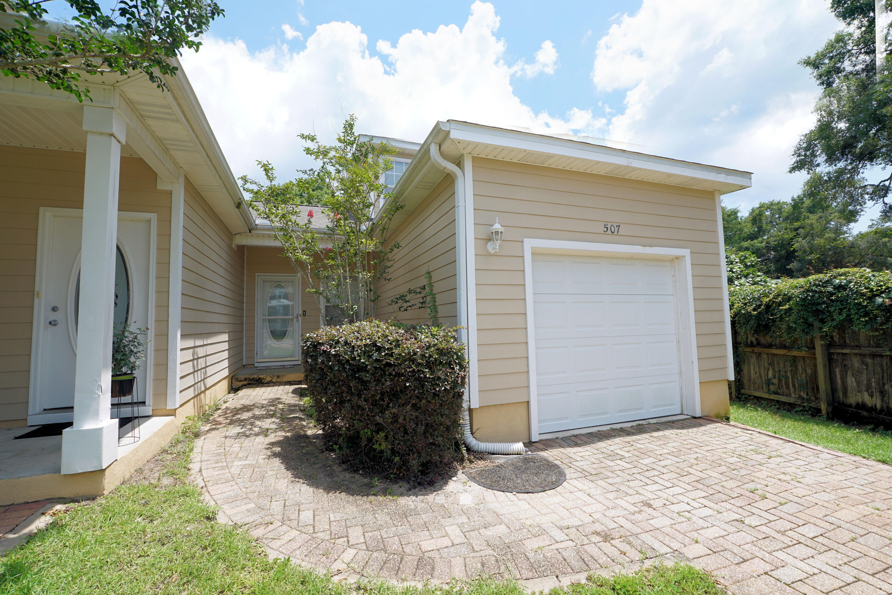 Welcome to this beautifully furnished end-unit townhome featuring 3 bedrooms, 2 bathrooms, a garage, and an extended driveway for extra parking. Ideally located within walking distance to the bayou, this home offers comfort, convenience, and coastal charm. Inside, you'll find an inviting layout with a downstairs bedroom, granite countertops, stainless steel GE appliances, and tasteful furnishings throughout. The screened- in porch provides the perfect spot to relax and enjoy the Florida lifestyle. Whether you're looking for a primary residence, second home, or investment opportunity, this fully furnished townhome is move-in ready and waiting for you.