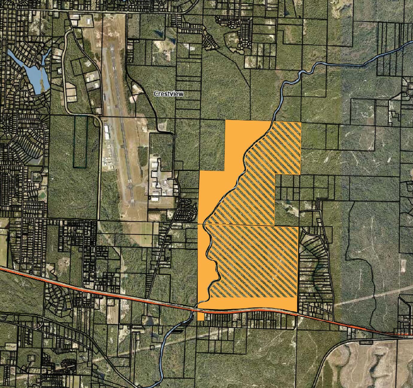 Attention developers, builders, and investors!! Located in the heart of one of Northwest Florida's most promising growth corridors, this exceptional development tract offers a rare opportunity to invest in the region's future. Located about 2 miles west of the Shoal River Ranch Gigasite, the property sits near the future Williams International aviation gas turbine engine manufacturing campus, a multi-billion-dollar investment expected to drive substantial job creation, population growth, and economic activity for decades to come.

With its size, location and development potential, the property is well-suited for a master-planned residential community, mixed-use development or other large-scale investment opportunities. As the surrounding area continues to attract new employers, residents and infrastructure improvements, demand for housing and supporting commercial services is expected to increase significantly.

The tract offers a unique combination of accessibility, natural features and long-term growth potential. Portions of the property are enhanced by river frontage and natural green space, creating opportunities for thoughtfully designed communities that incorporate recreational amenities and conservation areas.