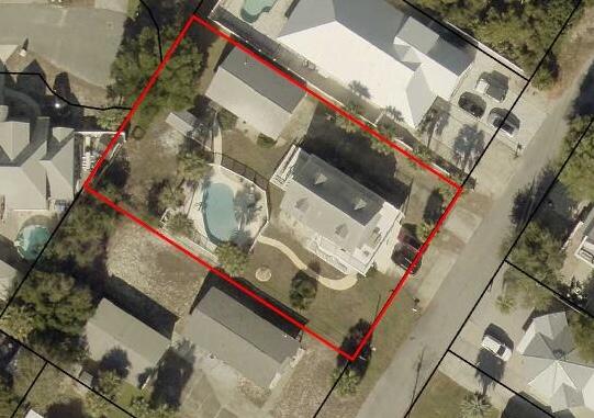 MOTIVATED SELLER! PRIME BID-A-WEE OPPORTUNITY! PRIVATE BEACH ACCESS!
Location. Lot Size. Potential.

Opportunities like this rarely come available in the highly sought-after Bid-A-Wee Beach community. Situated on what is likely one of the largest lots in the neighborhood at approximately 95' x 150', this property offers endless possibilities just 3 short blocks from Bid-A-Wee's dedicated private beach access.

Yes, the home needs updating and TLC--but the value is in the location, oversized homesite, and flexible living spaces that are increasingly difficult to find this close to the Gulf.

The property features multiple living areas, including a private lower-level guest suite complete with a bedroom, full bath, kitchen, laundry, and spacious living area--ideal for extended family, guests, or multi-generational living.

A detached two-car garage includes an additional efficiency-style living space, while the resurfacing pool creates the perfect backdrop for entertaining and enjoying Florida living.

The main residence offers generous living spaces with an open-concept family room, dining area, and kitchen, along with multiple bedrooms, baths, abundant storage, and expansive outdoor decks where you can enjoy Gulf breezes, morning coffee, and spectacular sunset skies.

Convenient ramp access from the ground level makes everyday living easy for groceries, strollers, luggage, and more.

With Gulf views, private beach access, an oversized lot, pool, guest quarters, and unlimited potential, this is a rare chance to create your dream beach retreat in one of Panama City Beach's most cherished coastal communities.

Bring your vision and discover what this exceptional property can become.