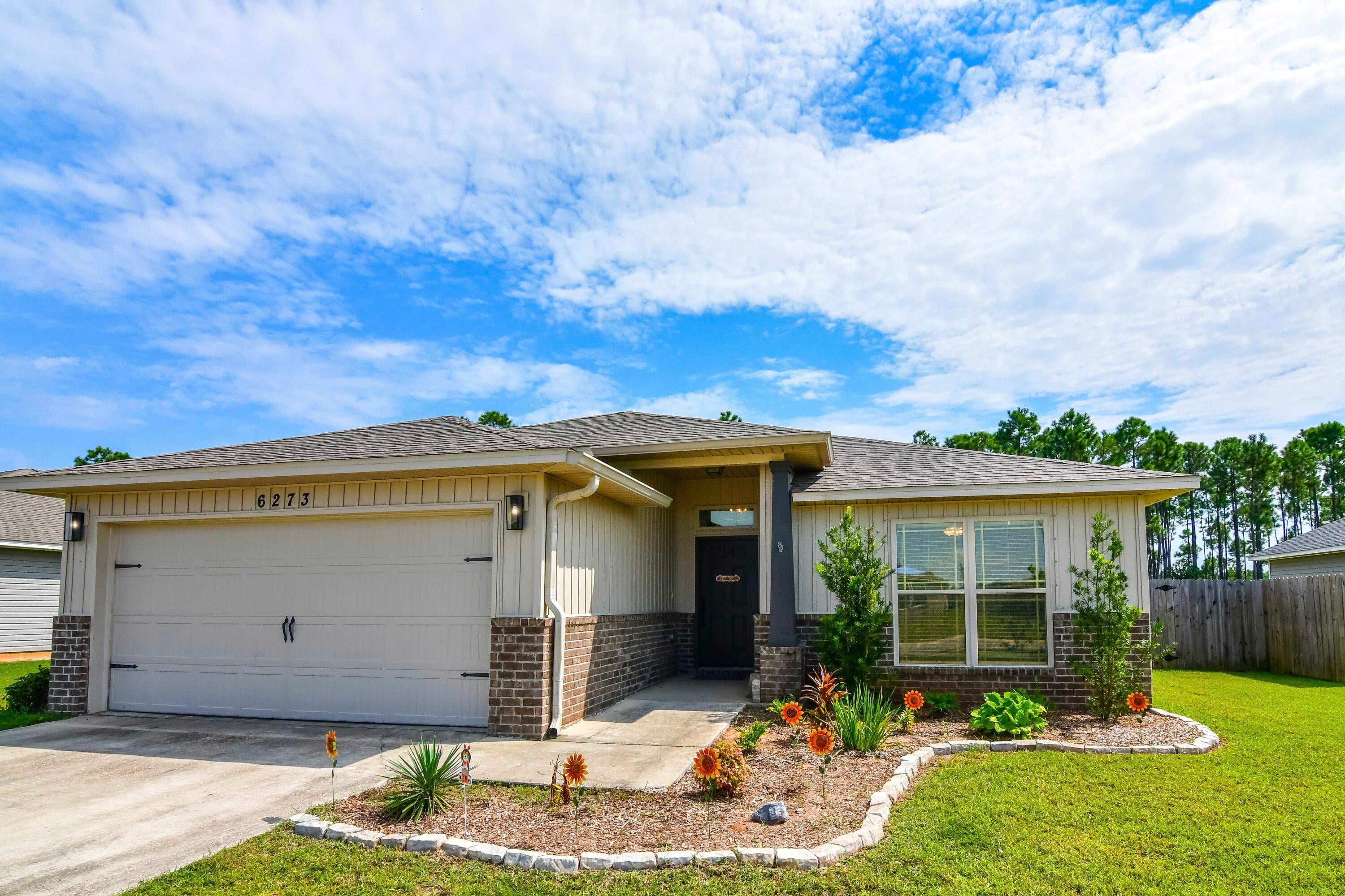 2021-Built Single-Level 3BR/2BA Home in Heather's Place, Gulf Breeze with Fenced Backyard

Welcome to this 2021-built, single-level home in the Heather's Place neighborhood, featuring 3 bedrooms, 2 bathrooms, vaulted ceilings, and a large fenced backyard. The bright, open living area is enhanced by a vaulted ceiling, abundant natural light, and ceiling fans throughout the home.

The kitchen offers granite countertops, stainless steel appliances, ample cabinetry, and plenty of storage. The primary suite includes a relaxing bathroom with both a walk-in shower and soaking tub. With a functional one-level floor plan and thoughtful storage throughout, this home is designed for comfortable everyday living.

Step outside to a spacious fenced backyard with room for outdoor dining, play, pets, gardening, or simply enjoying the Florida sunshine. Conveniently located approximately 2.7 miles from Soundside High School and 11 miles from Navarre Beach, this newer Heather's Place home offers an appealing blend of location, comfort, and modern finishes.

Property Highlights
• 2021 construction
• Heather's Place neighborhood
• Single-level layout
• 3 bedrooms and 2 bathrooms
• Vaulted ceiling in the living area
• Granite countertops
• Stainless steel appliances
• Walk-in shower and soaking tub
• Ample storage
• Abundant natural light
• Ceiling fans in every room
• Large fenced backyard