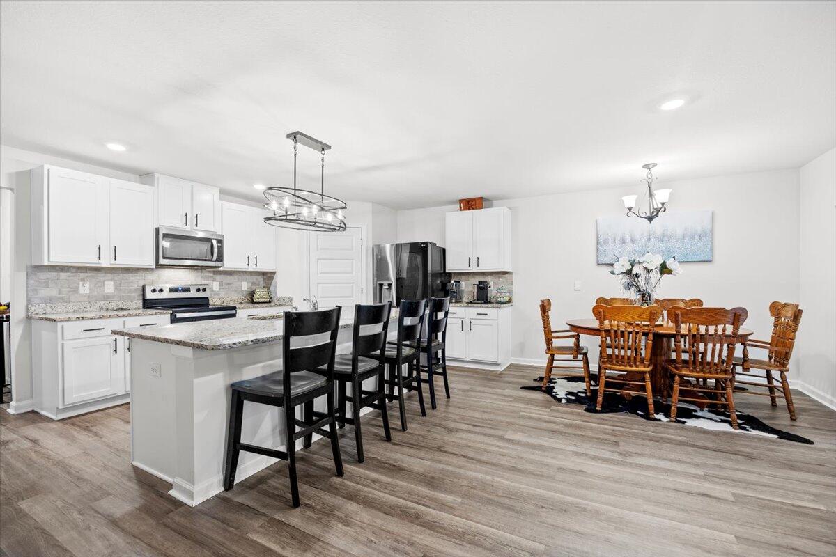 MOVE-IN READY, SKIP THE WAIT and instant BUILT-IN EQUITY! Why wait months for new construction when you can move in now? This 2023-built Cali model in East Milton offers the same layout and design as the nearby homes without the delays, uncertainty, or added costs. This 4-bedroom, 2-bath home delivers over 1,800sqft of open, functional living space designed for real life. Alongside a fully fenced-in backyard providing enhanced security, privacy, and safety for pets and children. What really makes this home stand out: Move-in ready - no construction timeline. Appliances, blinds, and features already in place. Established setting--no waiting on surrounding builds. Clean, well-maintained, and ready for immediate occupancy. Located in a growing East Milton community with convenient access to Pensacola, local bases, and major roadways. If you've been considering new construction, this is your opportunity to get the same home faster, simpler, and ready today. Schedule your showing now!