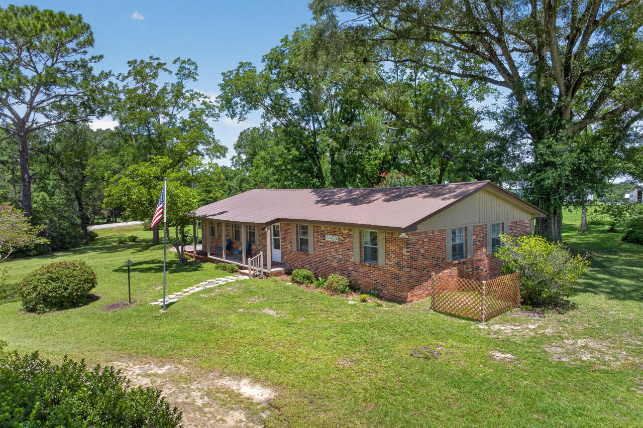 Welcome Home to North Walton County! Discover the perfect blend of comfort, space and country charm in this beautifully maintained, move-in ready home located in one of North Walton's most desirable areas. Situated on just over an acre in the sought-after Paxton School zone, homes of this quality are a rare find! Designed with functionality and family living in mind this home offers 4 bedrooms (one currently functioning as an oversized laundry room), 2 full baths and multiple living and dining spaces to accommodate everyday life and entertaining alike. Kitchen features custom built real wood cabinetry and opens into additional dining or family room creating a warm inviting space. The living room and dining room greet you just inside the entrance. Step outside and find all the room you need for country living. Raise chickens, garden, children playing, or just enjoy the country. There are 2 parcels included in this to constitute the 1.1 acres. If you have been looking for your own slice of country living, THIS IS THE ONE!
Come experience country life in North Walton County or as we call it...GOD'S COUNTRY!!