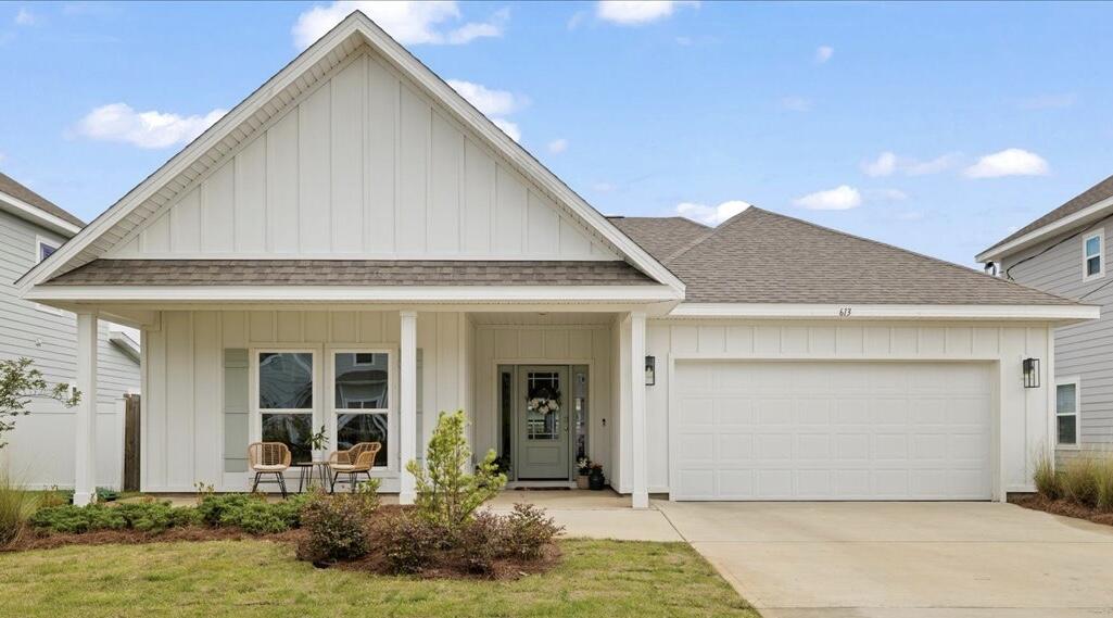 Welcome home to this must-see 2022-built single-story home, ideally located just minutes from the Gulf and 30A. This well maintained 3-bedroom, 2-bathroom home blends modern and coastal elements, offering an open, light-filled layout designed for effortless living. Step inside to soaring ceilings and a seamless flow between the roomy foyer to the gourmet kitchen, elegant dining area and inviting family room - an entertainer's dream and cozy retreat all in one. The kitchen is fully equipped and features a spacious island, LG refrigerator, abundant cabinetry, and pantry. Expansive windows flood the living spaces with natural light, creating an airy, comfortable ambiance.Embrace Florida living on the charming front porch overlooking a newly sodded lawn or retreat to the private fully-fenced spacious backyard with a covered patio ideal spaces for kids, pets and al fresco gatherings. The spacious primary suite is a serene escape, boasting a tray ceiling, walk-in closet and an en-suite bathroom that has dual vanities, tiled walk-in shower, a soaking tub, and a private water closet offering a relaxing escape at the end of the day. The two additional bedrooms and well-appointed bathroom on the opposite side of the house offer flexibility for family, guests, or a home office set up. The two-car garage with additional storage shelving easily accommodates beach gear and water toys, perfect for coastal living and adventures at the neighborhood's bay access point ideal for kayaking and paddle boards. The home also comes with a home security system, Murphy bed, and a Samsung smart washer and dryer for ultimate convenience. Nestled in a quiet and friendly neighborhood, this home is just minutes from Sacred Heart hospital, 30A Public Beach Accesses, Grand Boulevard's upscale shopping and dining, and Topsail Hill Preserve State Park. Don't miss out on this incredible opportunity for a move-in-ready gem that combines style, function and a prime Santa Rosa Beach location.