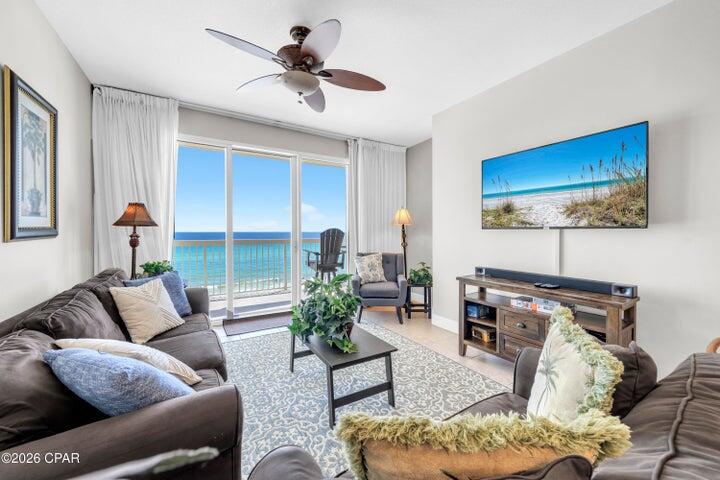 Excellent opportunity at Celadon Beach Resort -- an absolute must-see! Experience luxe seaside living with a true toes-in-the-sand location directly on the emerald waters of the Gulf. Celadon 502 showcases one of the most sought-after floorplans in Panama City Beach: a Gulf-front master suite with balcony access, a second bedroom, a separate bunk room, and two full baths. Thanks to the dedicated bunk room, the condo lives and rents as a 3BR/2BA, comfortably sleeping eight. The open layout, 9' ceilings, and triple-panel sliding glass doors flood the space with natural light and frame stunning Gulf and sunset views from the living room, dining area, kitchen, balcony, and master suite. Offered fully furnished and truly turnkey, this condo is ready to enjoy or rent immediately. Perfectly positioned on the desirable fifth floor, this residence offers an ideal elevation -- high enough for sweeping views of the emerald waters and sugar-white beaches, yet close enough to still enjoy the sights and sounds of the Gulf below. Nestled on the peaceful west end of Panama City Beach, Celadon offers the perfect balance of tranquility and convenience, just 10 minutes to both 30A and Pier Park. Resort-style amenities include 283 feet of pristine Gulf frontage, two pools (indoor/outdoor and Gulf-front), hot tubs, a tennis court, fitness facility, media room, and covered parking with walk-over access.  Whether as a vacation home, full-time residence, or high-performing rental, Celadon 502 is a rare find and an exceptional Emerald Coast retreat. Don't miss this opportunity. All measurements deemed accurate; buyer to verify if important.