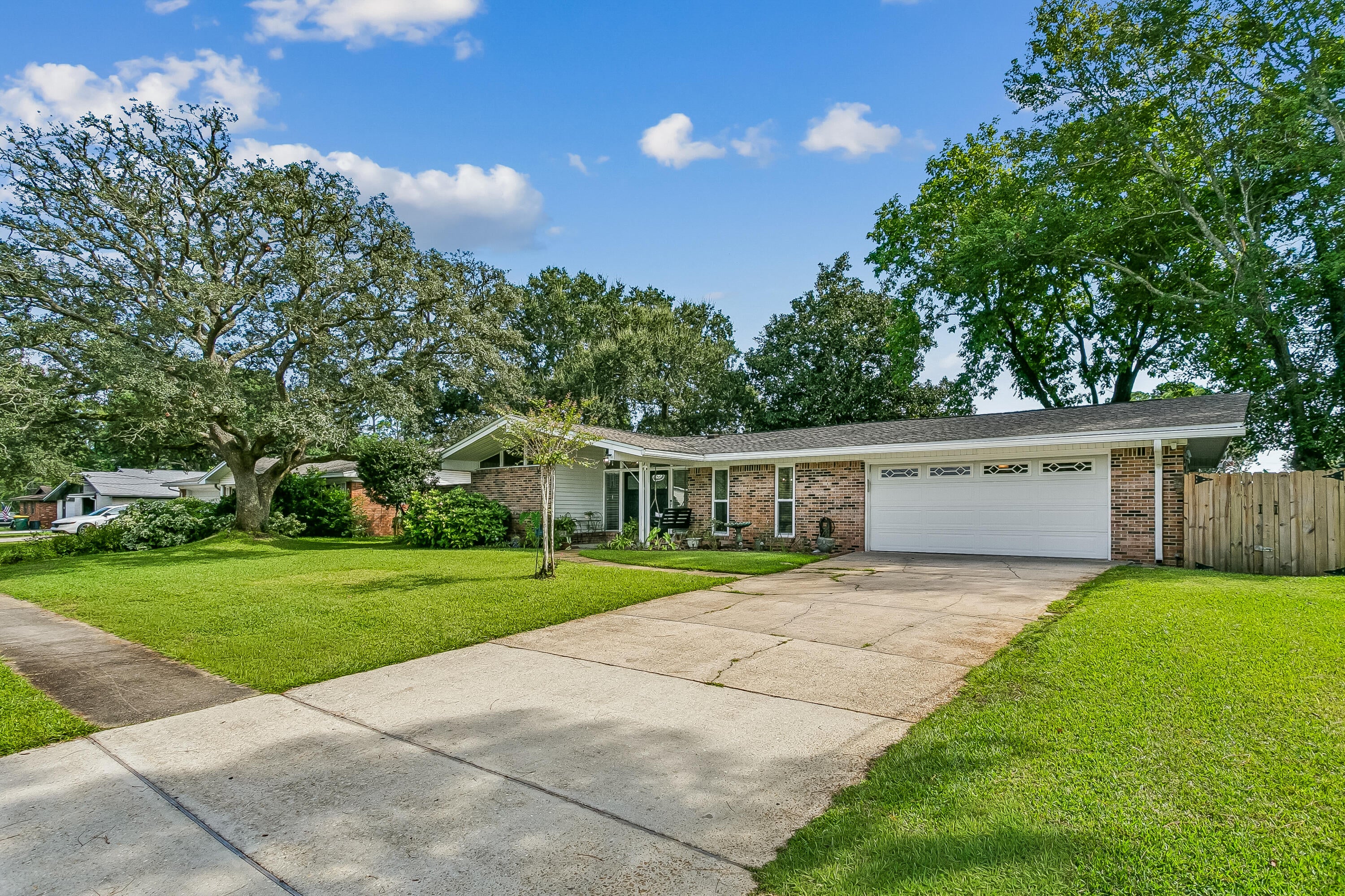 MOVE-IN READY IN THE HEART OF FORT WALTON BEACH! Welcome to 340 NW Holmes Blvd, where thoughtful updates, comfortable living space, and a convenient location come together in one inviting home.

Inside, you'll find wood look tile flooring throughout, fresh interior paint completed in 2025, and an updated kitchen featuring marble countertops, a gas stove and dishwasher. The sellers have continued improving the home over the years, including updated lighting, added attic insulation, cleaned air ducts, and multiple newer windows and sliding glass doors.

The enclosed porch adds valuable bonus living space, perfect for relaxing, entertaining, a home office, playroom, or hobby area, while multiple sliding glass doors help create an easy connection between the indoor and outdoor spaces. Outside, the privacy fence creates a more secluded backyard, and a newer lawn pump adds convenience for maintaining the property.

Major systems have also seen updates, with the seller reporting the roof at approximately five years old and HVAC approximately four years old. The home features gas service, and AT&T Fiber is available for high-speed internet.

 Located in Fort Walton Beach with easy access to shopping, dining, schools, military installations, and the beautiful Emerald Coast, this home offers the combination buyers are looking for: important updates already completed, flexible living space, a private backyard, and a central location.

Don't overlook this one, schedule your showing and see just how much 340 NW Holmes Blvd has to offer!