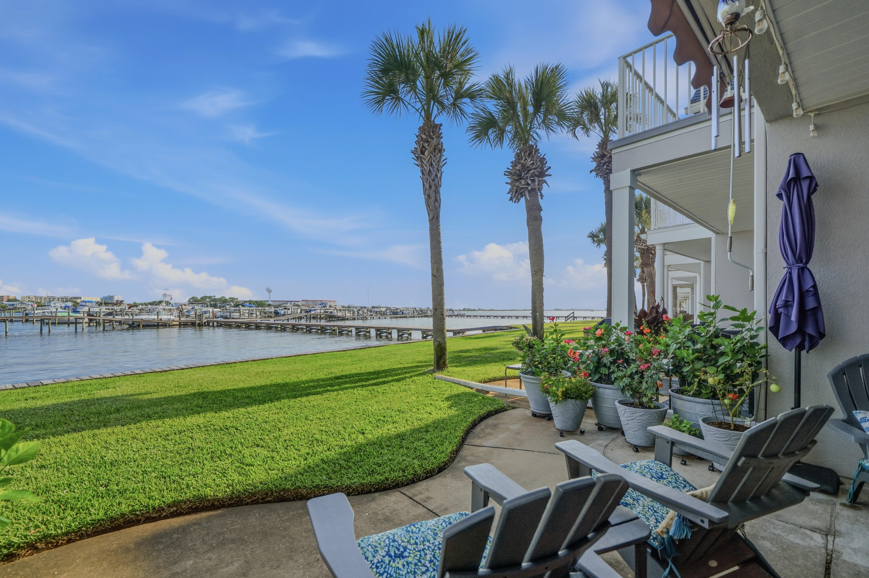 BOATERS, THIS IS THE OPPORTUNITY YOU'VE BEEN WAITING FOR! Brooks Landing owners have the exclusive opportunity to purchase available slips within the shared marina serving all three sister buildings, 2 Pirates Bay and Brooks Landing. Currently, several slips are listed for sale ranging in size from approximately 54ft to 28ft for purchase separately, and prices range from 9k to 15k approximately per slip depending on size, location, etc. --making this an exceptional chance to enjoy true waterfront living with your boat just steps from home at a bargain price. Each slip has water and power available and lifts may be added. Marina HOA fee for a slip is $453 per quarter no matter the slip size. There are also several slips for rent as well. As an owner, if you choose to purchase a slip then you can also rent the slip for additional revenue. Brooks Landing is a gated waterfront community where every day feels like a coastal retreat. This fully remodeled, move-in-ready townhouse showcases expansive water views, designer finishes, and one of the most exciting boating opportunities. Brooks Landing residents enjoy two waterfront pools, a shared marina, fishing, kayaking, paddleboarding, and a tranquil gated setting--all while being conveniently close to everything Ft. Walton Beach & Destin has to offer. Inside, you'll find a beautifully updated home Where every major improvement has already been completed. The stunning kitchen features granite countertops, new appliances, and opens to spacious living areas that capture the water views. The primary suite offers a luxurious spa-inspired bath, custom closet system, and French doors leading to your private balcony. Relax outdoors on the new Trex balcony or beneath the retractable 10' awning while enjoying peaceful waterfront sunsets. Great spot to take in the Fireworks display on your favorite holidays! Extensive Updates Include: 2026: Completely remodeled downstairs bathroom, 2025: Fully remodeled primary bath, granite countertops, new kitchen appliances, new water heater, Trex balcony, patio ceiling fan, and new downstairs baseboards, 2024: Custom primary closet system, 2023: Impact-rated windows and sliding doors, 2022: New roof, gutters, guest bathroom remodel, upstairs tile flooring, fresh paint, baseboards, French balcony doors, ceiling fans throughout, and retractable awning. Valuable Extras Included: VA assumable loan at an incredible 2.375% (for qualified VA buyers), Flood policy quote $1883.70, Washer & dryer, 75" living room TV, Ring doorbell, Garage refrigerator. Terminix termite bond in place and HOA includes pest control
This is more than a beautifully renovated townhouse--it's a rare chance to own a waterfront lifestyle with an affordable pathway to boat slip ownership in one of Ft. Walton hidden gems.