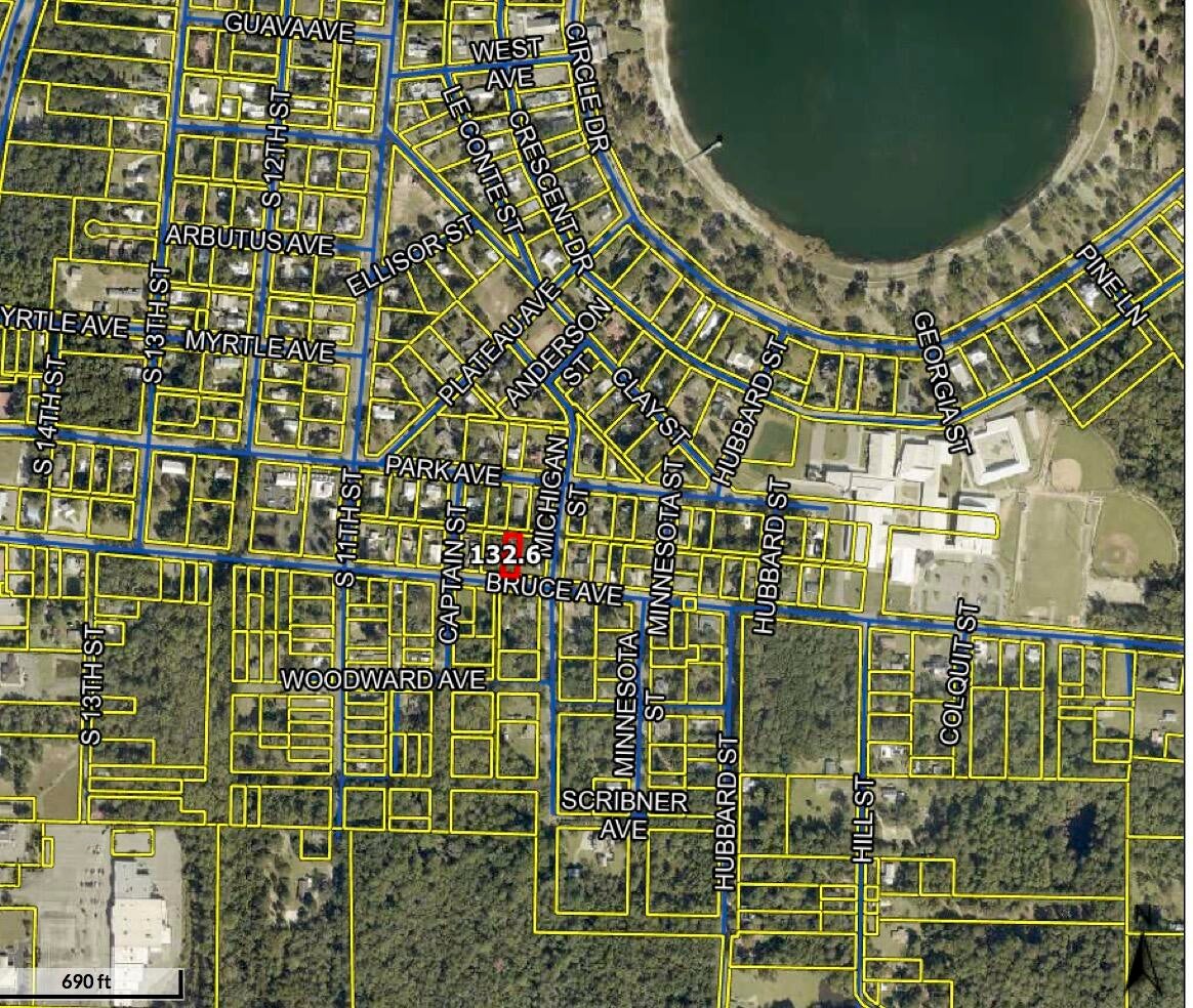 Beautiful vacant wooded lot located close to Lake DeFuniak and Historic Downtown. Within walking distance to the lake yard and paved street access. This lot has large shade trees and plenty of space for your custom home. Enjoy peaceful surroundings with in-town convenience.  This lot is priced right and ready for a new home.