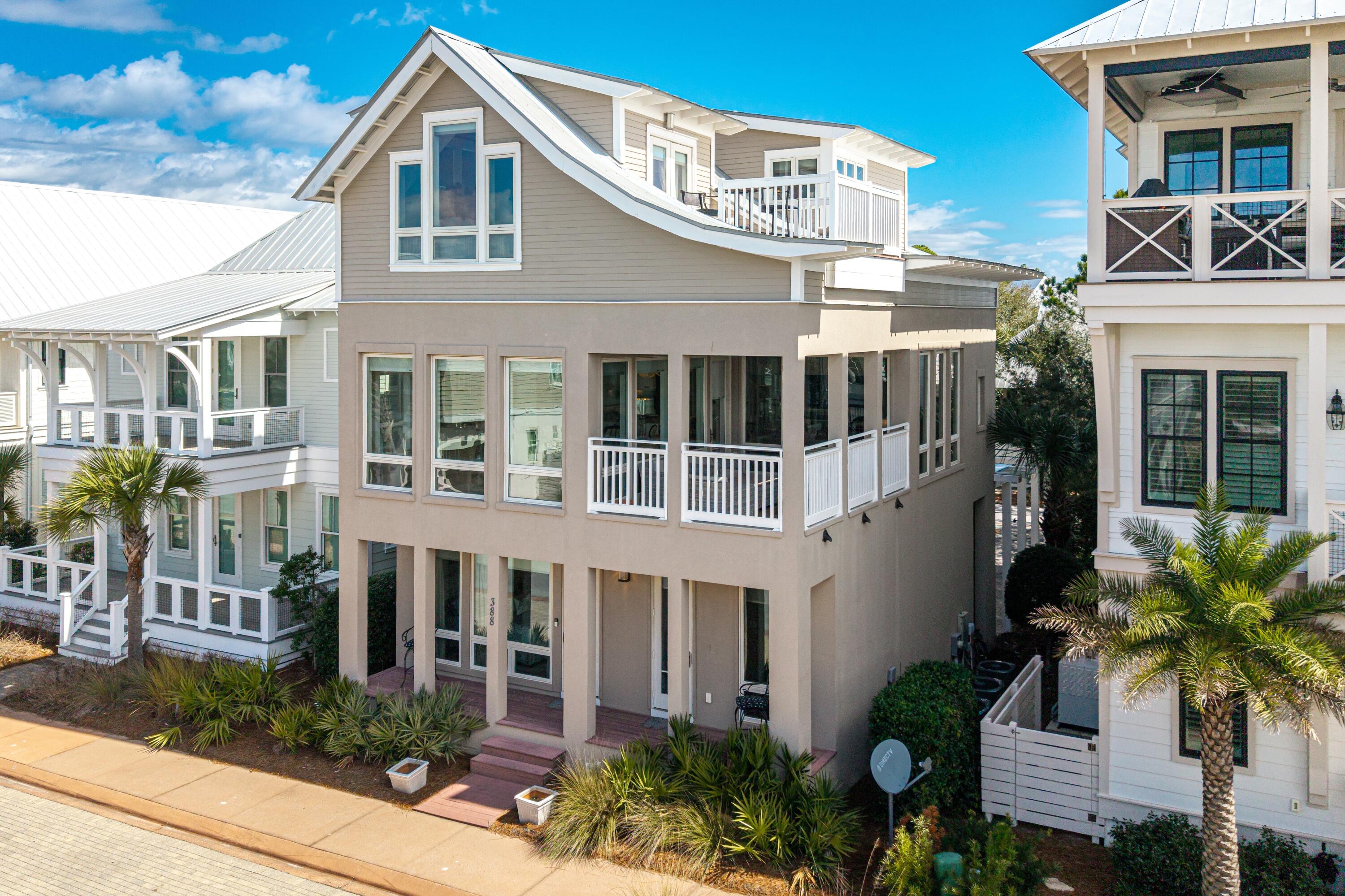 Located in the gated community of Cypress Dunes along the west end of Scenic Highway 30A, 388 Cypress Drive is a beautifully designed 3-bedroom, 3.5-bath coastal residence offering Gulf views, refined architecture, and rare expansion potential in a peaceful, natural setting.

The second-floor living space makes an immediate impression with dramatic wall-to-wall windows, flooding the home with natural light and creating a bright, elevated coastal aesthetic. The kitchen has been thoughtfully remodeled within the past five years and features modern finishes, including a striking waterfall-edge countertop that adds a clean, contemporary focal point. It flows seamlessly into the open living and dining areas--ideal for entertaining or relaxed everyday living.

Additional recent improvements include a new HVAC units, fresh interior and exterior paint, and updated bathroom countertops, providing both style and peace of mind for the next owner.

The third floor captures partial west-facing Gulf views and features a private balcony, perfectly positioned for sunset evenings and coastal breezes.

Rear alley access provides flexibility rarely found along 30A--the back portion of the lot offers space to build a two-car garage with carriage house above or expand the existing home, adding both functionality and long-term value.

Surrounded by the protected beauty of Topsail Hill Preserve State Park, the community offers a quiet, scenic backdrop while remaining conveniently close to the shops and restaurants at Gulf Place and Grand Boulevard. Beach access is just a short distance away, along with access to the trails and shoreline of Topsail Preserve.

Cypress Dunes amenities include a Gulf-view infinity-edge pool, outdoor fireplace and gathering pavilion, fitness center, tennis and pickleball courts, and winding nature trails.

An exceptional opportunity for a primary residence, second home, or investment property in one of 30A's most serene coastal settings.