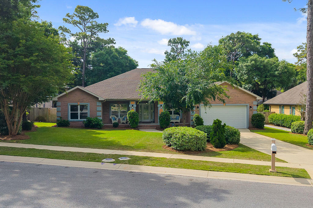 One Owner Home! Assumable VA @2.25%. Welcome to your own slice of summer paradise! This beautiful 4 bedroom, 3 full bath home is ready for pool parties, backyard BBQs, and making memories all season long. Featuring a private screened-in pool, this home offers the perfect blend of indoor comfort and outdoor fun. Inside, you'll love the spacious open floor plan with soaring 11' ceilings, a cozy gas fireplace, and plenty of room to gather and entertain. The formal dining room also makes a great flex space for a home office, playroom, or additional sitting area. The kitchen offers generous workspace and storage, along with a sunny breakfast nook overlooking the living area and pool. One of the standout features is the large heated and cooled Florida room. Perfect for relaxing after a swimhosting game nights, or enjoying your morning coffee year-round. This home has seen numerous recent updates:  Pool & spa - resurfaced 2026, Screen enclosure re-screened in 2020, new pool heater 2020; a complete interior repaint in 2026; a new fireplace box for the beautifully updated fireplace wall; LVP flooring 2020, All appliances 2020, Kitchen & 2 of the bathrooms have new granite tops. Additional major improvements include Roof replaced in 2024, A/C in 2019, and Water Heater in 2018. These are just a few of the highlights - See Improvements & Updates Sheet for full details! Whether you're entertaining friends, cooling off by the pool, or simply enjoying the spacious layout, this home was made for easy Florida living. Don't miss your chance to make it yours!
