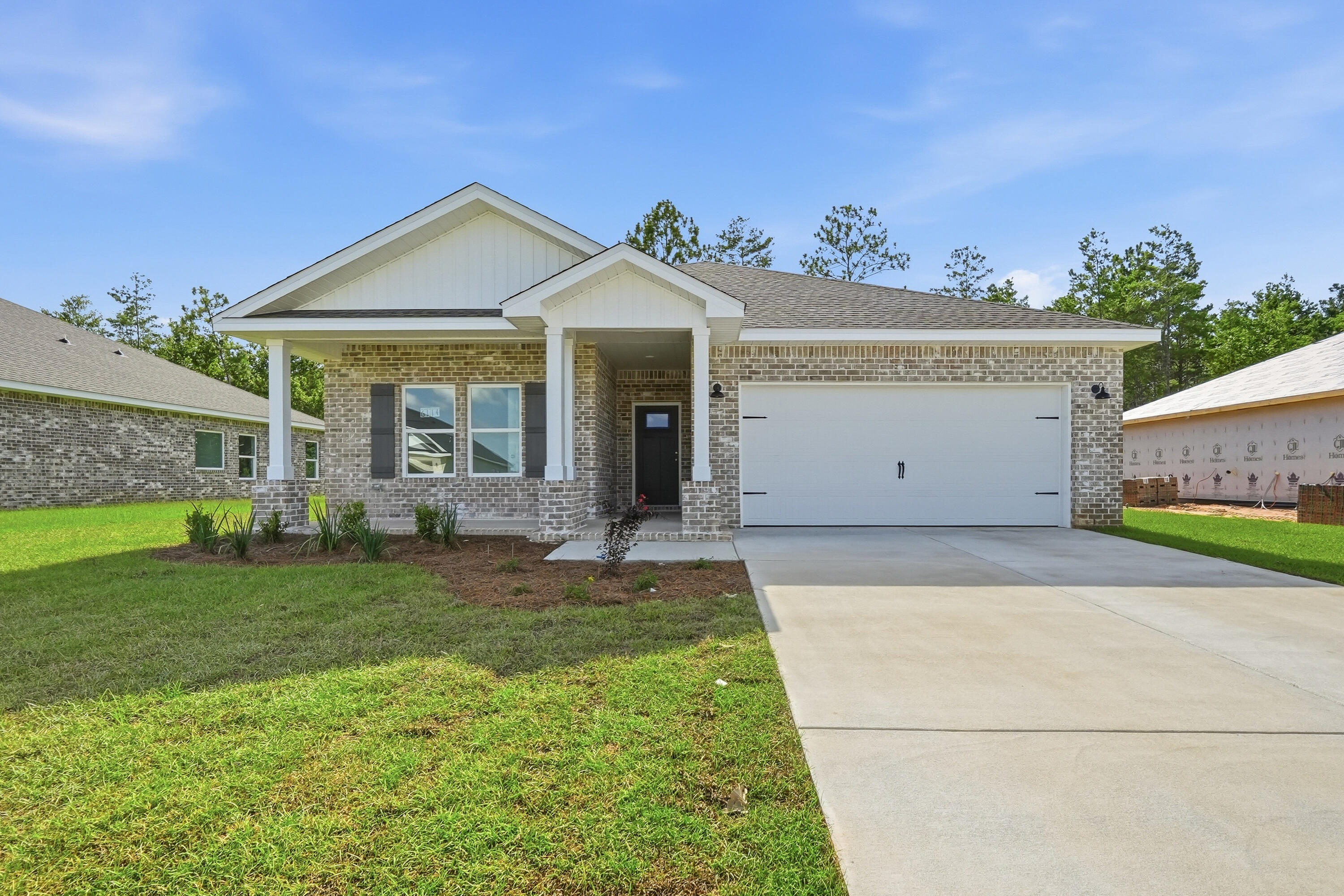 READY NOW - 'MAYBELL III' STRETCHED OUT TO 1616 SF - $20,000 towards closing costs/prepaids/rate buydown (Must close by October 30 - BUILDERS LENDERS ONLY.) 'Southern Charm S/D' has low county taxes, no HOA.  Seamless flow from the foyer to open family gathering space overlooking kitchen/dining nook.  Raised ceilings, recessed lighting with luxury vinyl plank flooring in main areas.  Quartz work island has bar seating, white shaker style cabinets + corner pantry.  Split BR plan with owner's bath featuring double vanities, walk-in closet, shower only & linen storage.  Cozy front and rear porches, landscaped 1/4-acre lot, and finished garage. INTERIOR PHOTOS OF SIMILAR SOLD HOME COLORS & FINISHES WILL VARY.
