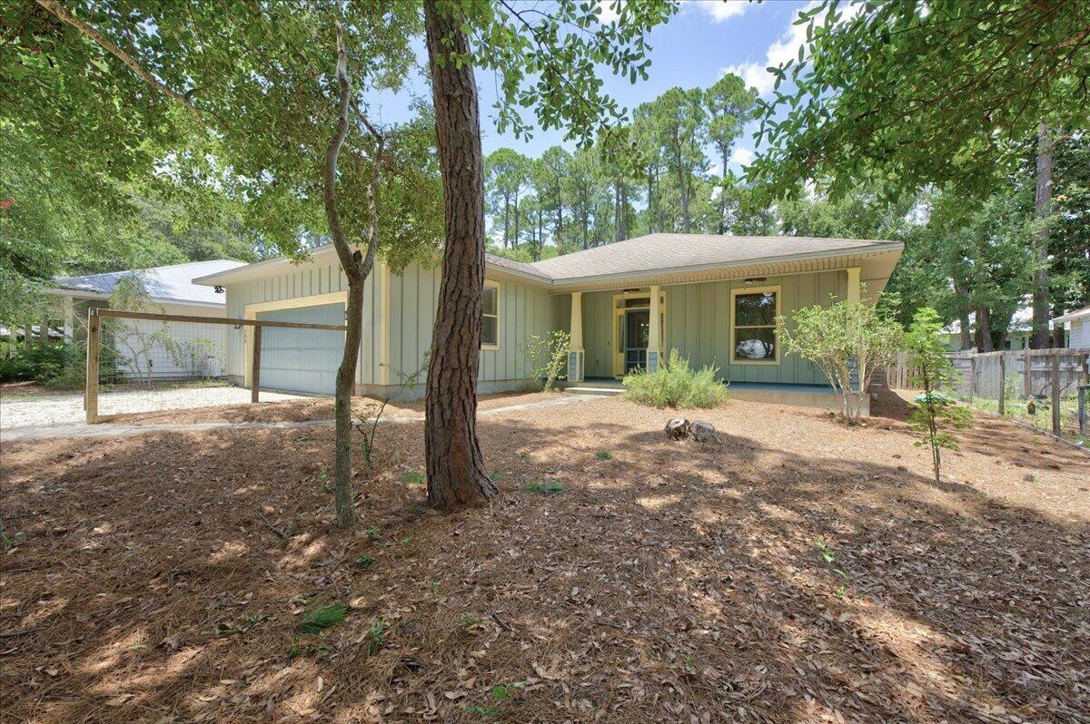 Nestled in the highly sought-after Point Washington community, this beautifully maintained home offers the perfect blend of coastal charm, convenience, and quality upgrades. Located just one block from Choctawhatchee Bay, you'll enjoy easy access to the bay for launching a paddleboard, kayak, fishing, or simply taking in the breathtaking waterfront sunsets.

Inside, the home features engineered hickory hardwood flooring throughout the main living areas, adding warmth, durability, and timeless style. The bathrooms and laundry room have been updated with new flooring, providing a fresh, modern feel. The layout is complemented by an oversized two-car garage, offering plenty of room for vehicles, golf carts, storage, or a workshop.

Major mechanical updates include a HVAC system that is only two years old, giving buyers added peace of mind and improved energy efficiency.

Whether you're looking for a primary residence, second home, or investment property, this home places you in one of Santa Rosa Beach's most desirable neighborhoods--just minutes from the white-sand beaches of 30A, Grayton Beach, shopping, dining, and all the outdoor recreation the Emerald Coast has to offer, while still enjoying the quiet charm and laid-back lifestyle of Point Washington.