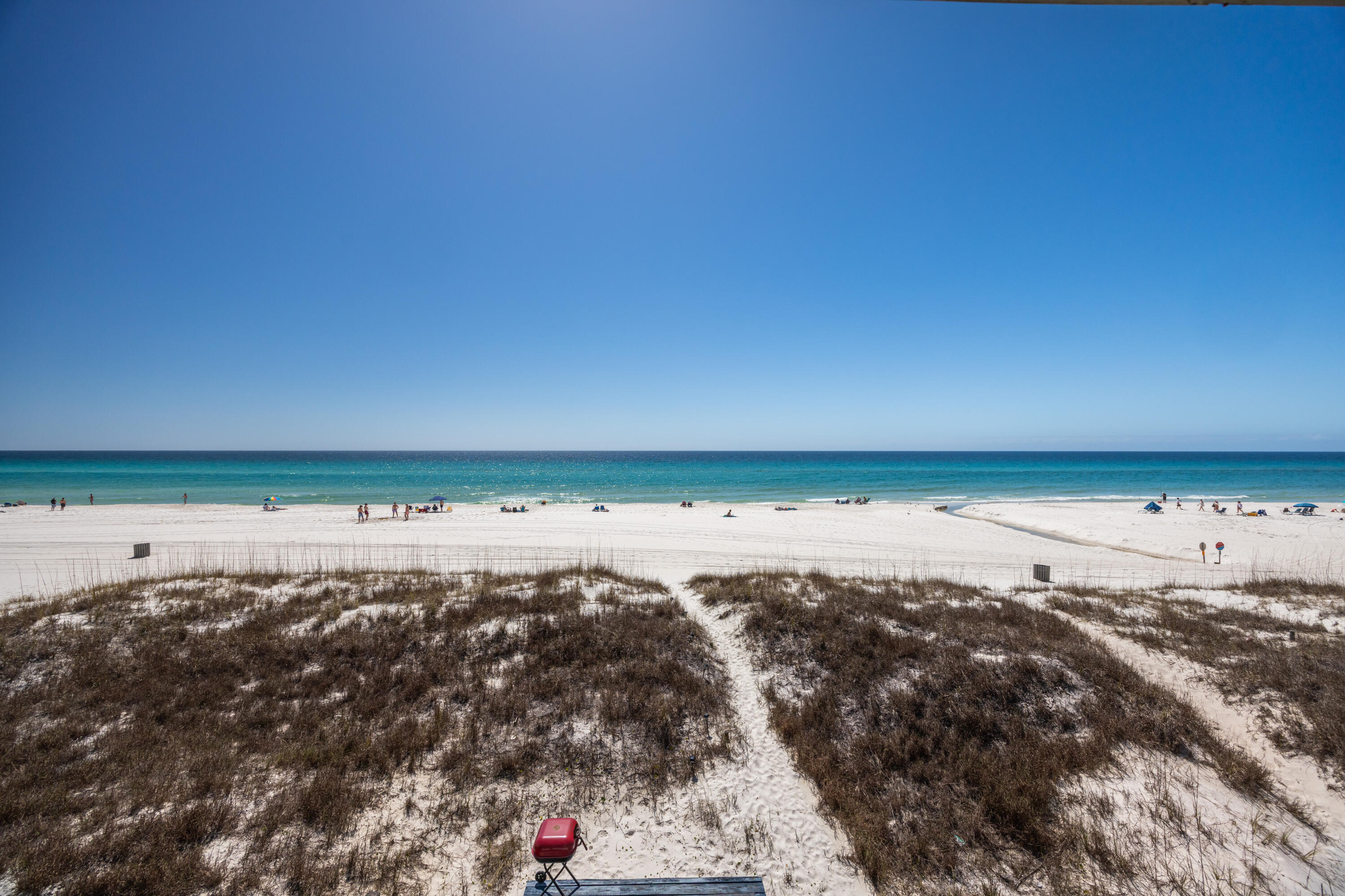 Seller is open to OWNER FINANCING.  Fully furnished, NO HOA townhome with DIRECT GULF ACCESS at 17709 Front Beach Rd #2 in Panama City Beach.  This TURNKEY BEACHFRONT PROPERTY offers stunning water views, open living spaces, and seamless indoor-outdoor coastal living. Enjoy TWO GULF-FACING BALCONIES, breathtaking sunsets, and the sound of waves from your doorstep. Ideal as a SHORT-TERM RENTAL INVESTMENT, second home, or full-time residence with NO HOA RESTRICTIONS. Located on the desirable west end near Pier Park, dining, and entertainment, while still offering a quieter beachfront setting. Rare GULF-FRONT ownership with strong income potential.