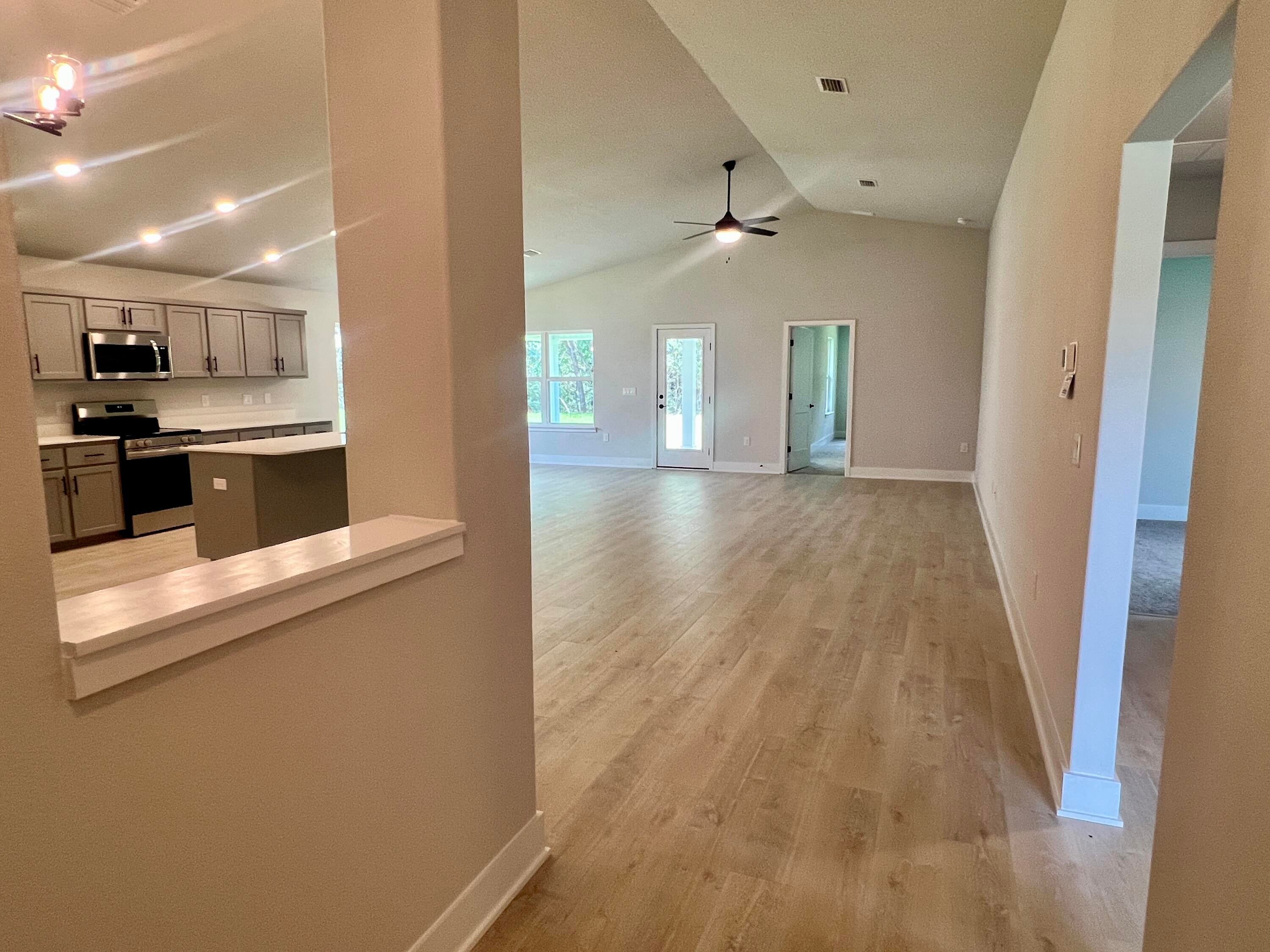Welcome to HIDDEN PINES by Adams Homes. Located just 30 minutes to Navarre Beach, with close proximity to schools, shopping and much more. This home is 3-sided brick with Hardi design front, 2 car automatic garage, sprinklers with timer, and a sodded yard with a landscaping package. Some upgrades that are being added to this home include granite/quartz countertops in kitchen and bathrooms, Puretec LVP flooring everywhere with carpet only in bedrooms, craftsman style elevation, garden tub and separate tiled shower in the master bathroom.