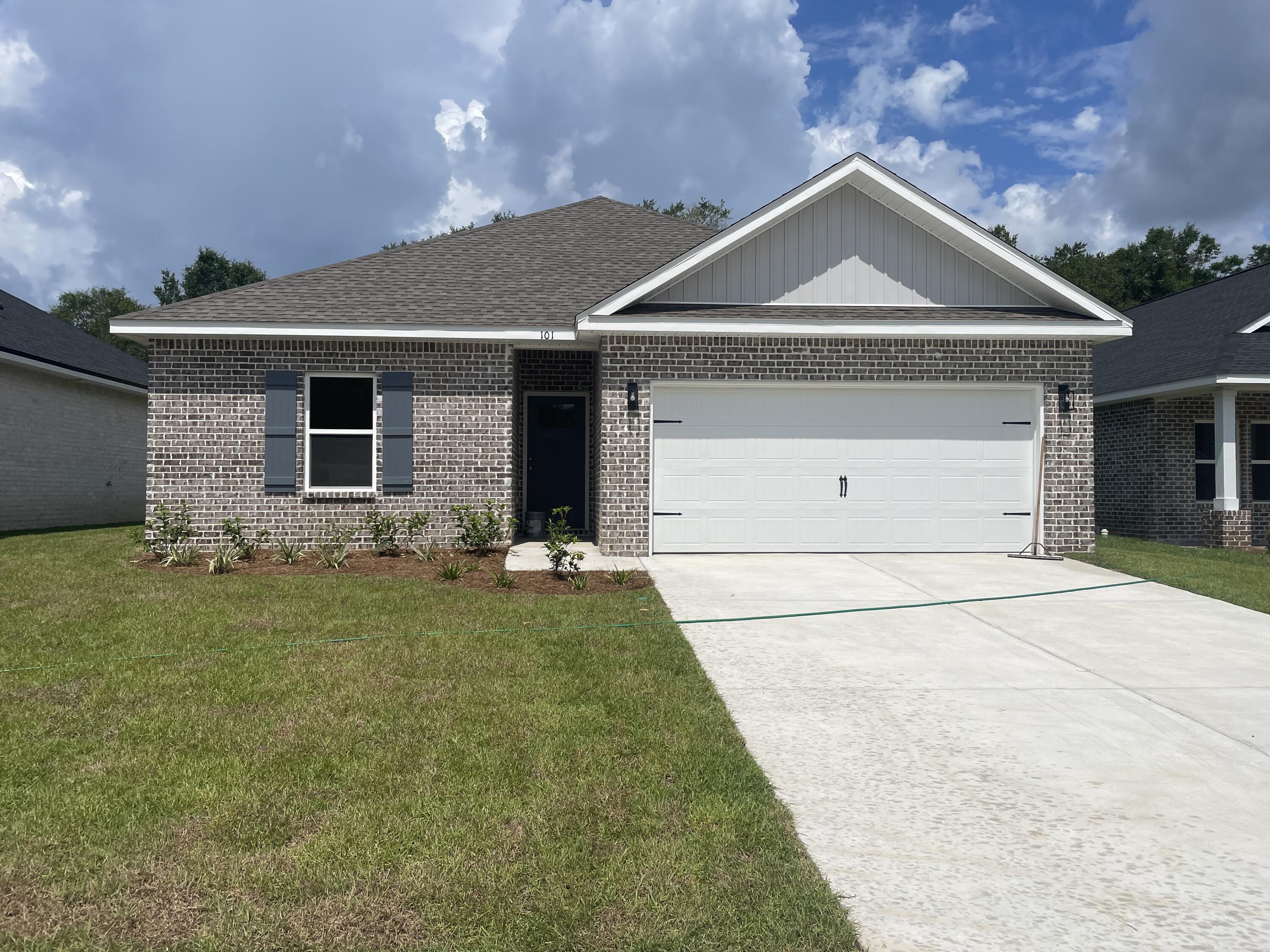 ''CARTER'' PLAN WILL BE READY IN EARLY SEPTEMBER - Convenient MID-TOWN location. Just under 1300 SF, all brick construction with fully landscaped yard, finished 2-car-garage and rear patio for relaxing.  Vinyl plank flooring throughout, raised ceilings, recessed lighting, ceiling fans in all bedrooms & living room.  Kitchen has cozy dining area, work island with bar seating, corner walk-in pantry and quartz countertops.  Seller will contribute up to $12,000 towards buyers closing costs (call for details).