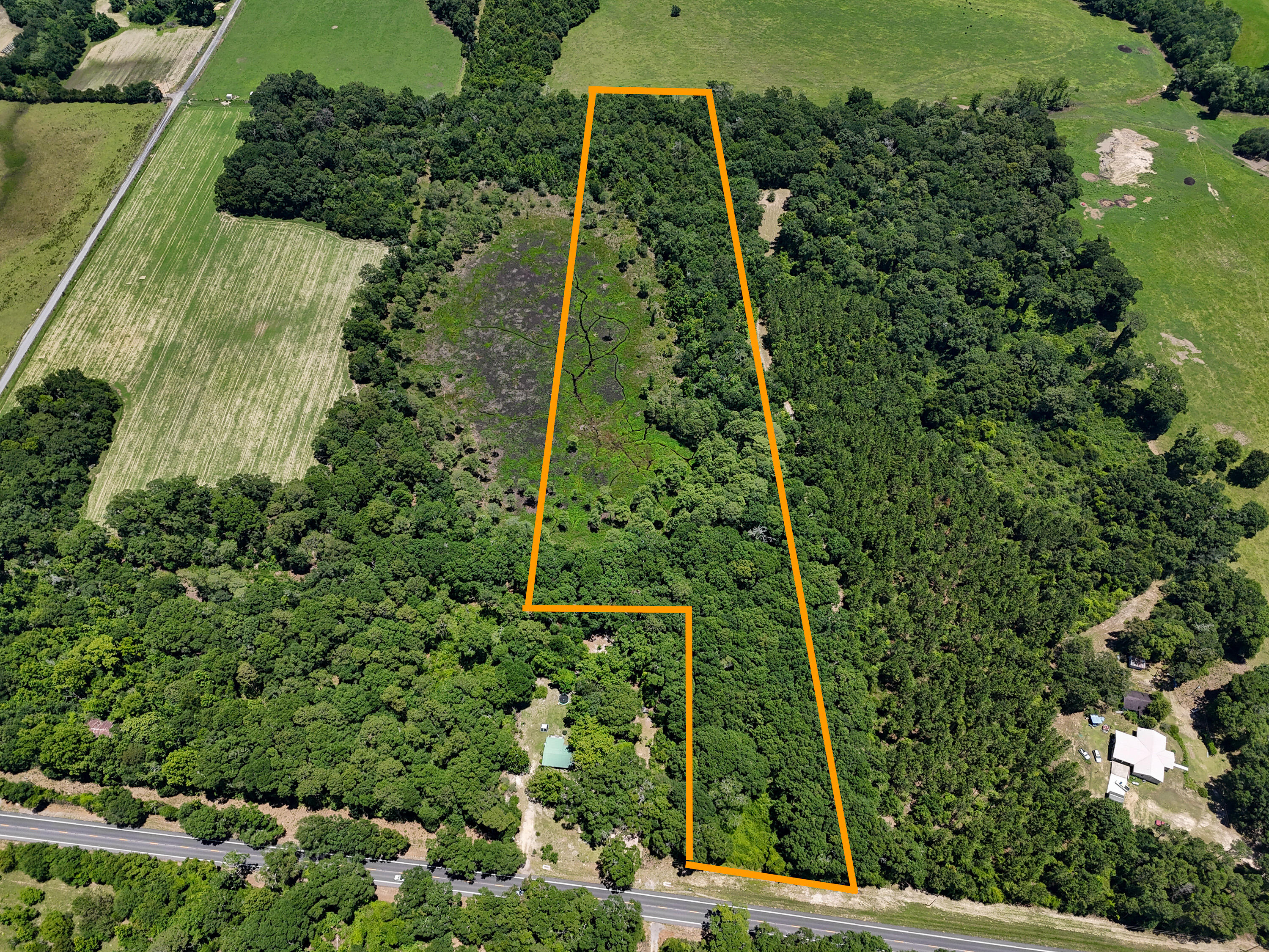 Discover the perfect blend of privacy, nature, and opportunity with this beautiful 8-acre parcel located in Northern Walton County at the Florida-Alabama state line. Whether you're looking to build your dream home, establish a private country retreat, or invest in land with endless potential, this property offers the peaceful rural lifestyle you've been searching for.

Surrounded by natural beauty and abundant wildlife, the property features access to a shared pond, creating a scenic setting for relaxing afternoons, fishing, or simply enjoying the tranquil views. The expansive acreage provides plenty of room for a custom home, workshop, recreational activities, or small hobby farm.

Conveniently located near the Florida-Alabama border, you'll enjoy the benefits of country living while still being within driving distance of shopping, dining, and everyday conveniences. With ample space, natural surroundings, and a picturesque pond setting, this property is a rare opportunity to own a slice of Northwest Florida's countryside and only an hour from the beach. 

Don't miss your chance to make this versatile 8-acre tract your own.
