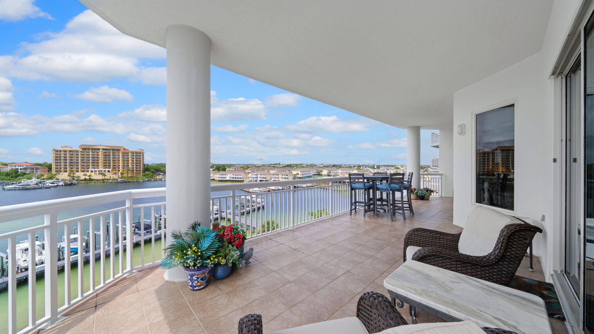 Welcome to Unit 401A at Harbor Landing - a truly exceptional coastal residence in the heart of Destin that redefines luxury waterfront living. Offering an unmatched blend of sophistication, comfort, and investment potential, this completely renovated condo is more than just a property, it's an experience. Included in the sales price are Boat Slip E-25 that measures 45' x 20'and a separate private parking garage w/ storage loft and Harbor Landing private deeded beach access. Harbor Landing 401A is a yachter's,fishing, beach lovers paradise. The attention to detail and custom-quality craftsmanship are impossible to ignore. Bathed in natural sunlight, this stunning residence features expansive front and back balconies showcasing breathtaking Gulf and harbor views, providing the perfect setting for morning coffee, spectacular Destin sunsets.The interior has been elegantly renovated with luxury finishes and premium-grade appliances elevating the entire living experience. Every space has been thoughtfully designed to feel more like a custom-built waterfront home than a condominium. From the upscale kitchen and designer finishes to the spacious living areas, no expense was spared in creating this one-of-a-kind retreat.Perfect as a primary residence, second home, or phenomenal investment property, Unit 401A offers the ideal combination of luxury and location. Put this property on your ''MUST SEE'' list TODAY!!!