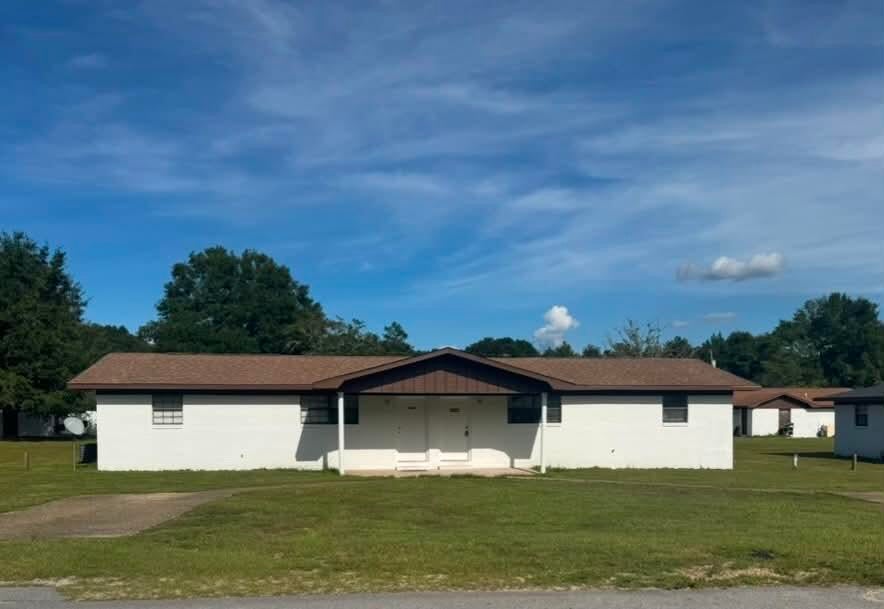 Newly remodeled 2-bedroom, 1-bath duplex in DeFuniak Springs Welcome to this clean and newly remodeled 2-bedroom, 1-bathroom duplex offering a comfortable and functional living space. The home features a spacious open-concept living area with durable tile flooring throughout. The living room flows into the updated kitchen, creating an open and inviting layout. The kitchen features white cabinetry, hard-surface countertops, a refrigerator, updated sink and faucet, and a convenient breakfast bar overlooking the living area. Both bedrooms offer natural light, tile flooring, and window blinds. Neutral colors and clean finishes throughout make the home easy to decorate and personalize. Rental application requirements include a completed application for all occupants 18 and older, proof of income, valid photo identification, background screening, credit review, and rental history verification. Income requirements, pet restrictions, and additional leasing terms may apply.