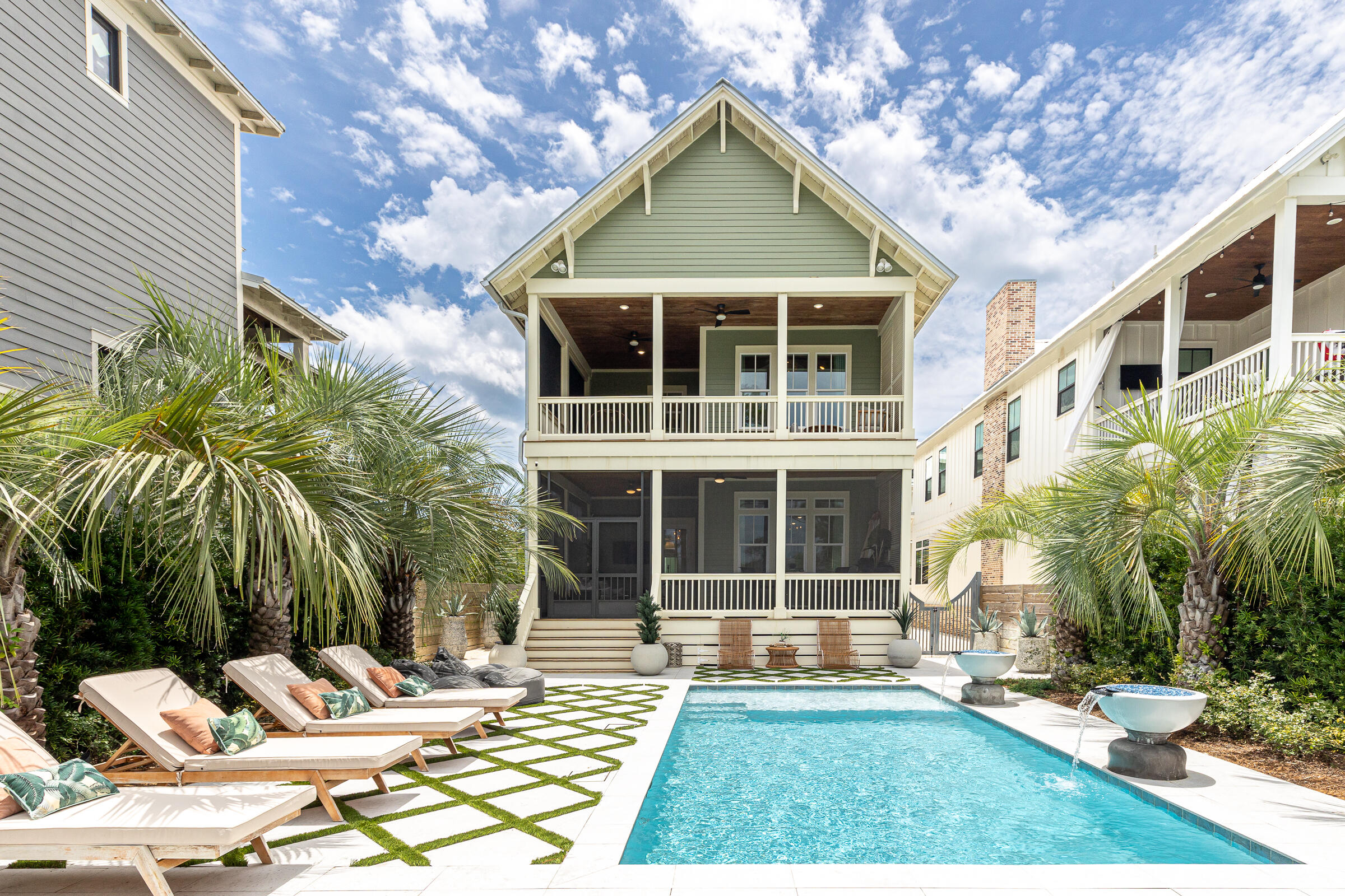 A rare waterfront retreat on the shores of Lake Powell, 17 Dulce Lane offers an exceptional coastal lifestyle with no HOA, just minutes from Rosemary Beach and Scenic Highway 30A. This beautifully updated property features a four-bedroom, four-and-a-half-bath main residence, a one-bedroom, one-bath carriage house, a private saltwater pool, and an expanded private dock with an upgraded boat lift. Offering exceptional value, the home is listed $250,000 below its November 2025 appraised value of $3,750,000. From the backyard, travel by boat, kayak, or paddleboard across Lake Powell to the beach. When the coastal dune lake's outfall naturally opens, boaters can also enjoy access to the Gulf.

Extensive custom upgrades have transformed the light-filled interiors, blending refined craftsmanship with relaxed coastal character. Shiplap walls, warm hardwood floors, and reclaimed Louisiana sinker cypress create a rich sense of warmth and authenticity throughout the home. The cypress was used to craft the fireplace mantels, ceiling beams, ceiling above the staircase, and dramatic vaulted ceiling in the primary bedroom. New designer lighting and chandeliers add another distinctive layer, including an antique French dining room chandelier dating to the late 1800s. Custom window shades have also been installed throughout.

The completely updated kitchen is a true showpiece, featuring new upper and lower cabinetry, high-end backsplash tile, updated plumbing fixtures, a waterfall-edge island and premium appliances. At its center is a handcrafted La Cornue range from France, complemented by a new Fulgor Milano refrigerator and freezer. A beautifully appointed wet bar and coffee area provides additional space for entertaining.

A custom wine cellar constructed entirely from reclaimed Louisiana sinker cypress offers an unforgettable place to display and enjoy a collection, while a built-in humidor adds another unique luxury feature.

The open living and dining areas flow seamlessly to a spacious screened porch and resort-style outdoor living area. The private saltwater pool is surrounded by Oyster White coral-stone decking, custom landscaping, mature citrus trees, Florida native seashell-stone accent boulders, and artificial turf throughout the property. Automated irrigation and landscape lighting with brass fixtures enhance the grounds while simplifying upkeep.

Designed for effortless year-round enjoyment, the pool features a smartphone-controlled Jandy automation system, a variable-speed pump, and a 400,000-BTU natural gas heater capable of heating the entire pool. Multiple automated smokeless fire features create an unforgettable evening setting, including a fire burner on the rear patio, two poolside fire-and-waterfall bowls, and a four-foot round fire bowl with a dedicated seating area overlooking the lake.

Beyond the pool, a pathway leads directly to Lake Powell and the expanded dock with its upgraded boat lift, making it easy to enjoy boating, fishing, kayaking, and paddleboarding. A custom powder-coated aluminum and stainless-steel walk-through gate provides access to the backyard. A whole-property generator offers additional comfort and peace of mind.

The first-floor guest bedroom includes a private bath with a walk-in shower and could also serve as a home office. Upstairs, the spacious primary suite features a dramatic sinker cypress ceiling, a custom-outfitted walk-in closet, and a private covered porch overlooking the backyard. The renovated primary bathroom showcases Italian marble tile, updated cabinetry, new plumbing fixtures, dual vanities, a freestanding soaking tub, and a walk-in shower. A secondary living room with a gas fireplace, two additional guest bedrooms, and two full bathrooms complete the second level.

Above the detached two-car garage, the private carriage house offers vaulted ceilings, a full kitchen, a separate bedroom, and a spacious ensuite. This flexible property is equally well suited as a primary residence, second home, or income-producing investment. Short-term rentals are allowed, providing the option to rent the entire property or occupy the main residence while renting the carriage house separately.

Additional improvements include upgraded tile in the downstairs powder room, updated lighting and plumbing fixtures, and a whole-home water-softening system.

Bordering the natural beauty of Camp Helen State Park, this extraordinary home feels peaceful and private while remaining convenient to the beaches, dining, shopping, and entertainment of Inlet Beach, Rosemary Beach, and 30A. With no HOA, flexible rental opportunities, exceptional craftsmanship, resort-style outdoor spaces, and direct access to Lake Powell, 17 Dulce Lane presents a truly distinctive waterfront opportunity.

The open living and dining areas flow seamlessly to a spacious screened porch and an extraordinary resort-style outdoor living area. The private saltwater pool is surrounded by Oyster White Coral Stone decking, all-new custom landscaping, mature citrus trees, Florida native seashell-stone accent boulders, and artificial turf throughout for a lush, low-maintenance setting. An automated irrigation system and landscape-lighting system with premium brass fixtures enhance the property's beauty and ease of ownership.

The pool is equipped with a smartphone-controlled Jandy automation system, a three-horsepower variable-speed pump, and a 400,000-BTU natural gas heater capable of heating the entire pool to 104 degrees. Smartphone-controlled smokeless fire features create a memorable setting for outdoor entertaining, including a fire burner on the rear patio, two poolside fire-and-waterfall bowls, and a large four-foot round fire bowl with a dedicated seating area near the lake.

Beyond the pool, a pathway leads directly to Lake Powell and the expanded dock with its upgraded boat lift, making it easy to enjoy boating, fishing, kayaking, and paddleboarding. A custom walk-through side gate constructed from powder-coated aluminum and stainless steel provides direct access to the backyard. A whole-property generator designed to power the main residence, carriage house, and exterior areas offers additional comfort and peace of mind. Offered fully furnished with a minor exclusions.