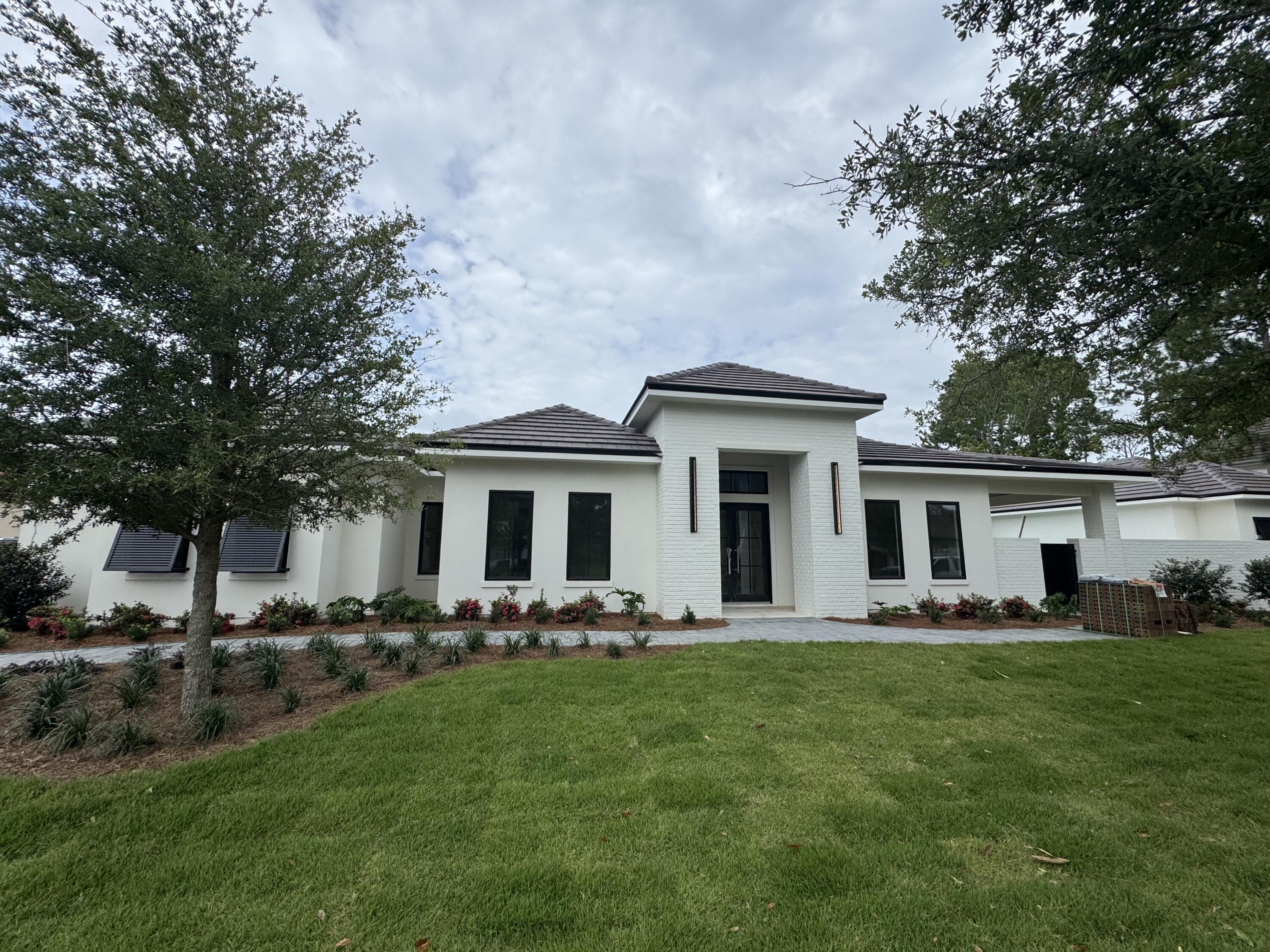 New construction home Is complete, and move in ready!! Priced below current appraisal. Welcome to 3563 Preserve Drive. This is an exquisite custom one-of-a-kind build behind the coveted gates of Burnt Pines.  This single-story estate spans over 120ft wide, with a total of 6,500 sq ft, with 4,506 sq ft of heated and cooled space. Embrace gorgeous sunrises over the nature preserve in the back, and watch the sunset in the front while relaxing in the courtyard pool while grilling with friends and family in the summer kitchen. This home features a master wing which encompasses the entire right side of the home. The master bath features Separate his/her bathroom vanities, a bidet, soaking tub, and stunning walk through shower. A generous office also completes the build. The Home is elegantly dressed with high end white oak wood trim throughout , and equipped with Wolf/ Sub Zero appliances, audio video features throughout with full 360 degree 24/7 surveillance.