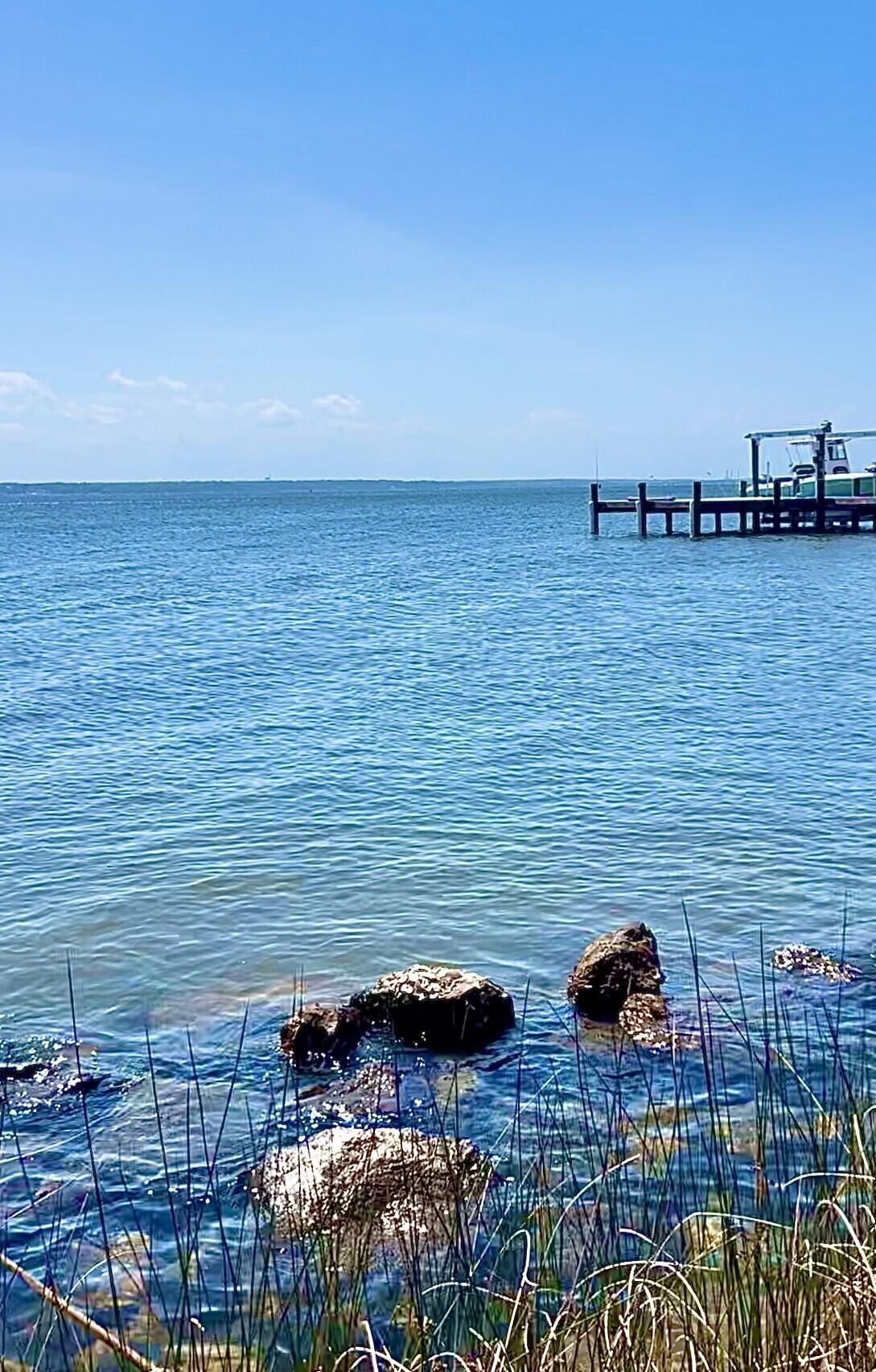 Excellent opportunity to buy and build right on the water, with .74 acres of land and 131 ft of waterfront in a well-established neighborhood of waterfront homes. 
Ideal for families, investors, or custom builders! Extensive seawall already done!

Situated less than two miles off Avalon Blvd, and convenient to Pensacola, Gulf Breeze, Pensacola Beach and Milton. Less than four miles to Interstate 10, and located in a private coastal setting of affluently appealing homes. Zoned R1, flat, and ready to clear and build your future home or vacation getaway. 

Ideal for those wanting to live outside the hustle and bustle of Pensacola while still being convenient for work, school, boating from your own dock, dining, shopping, and all the beautiful Northwest Florida Gulf Coast offers. 

Motivated seller and priced to move. Don't miss this opportunity to create your own coastal oasis with lots of privacy, beautiful views, and all that comes with spectacular waterfront living near some of the country's best beaches.!