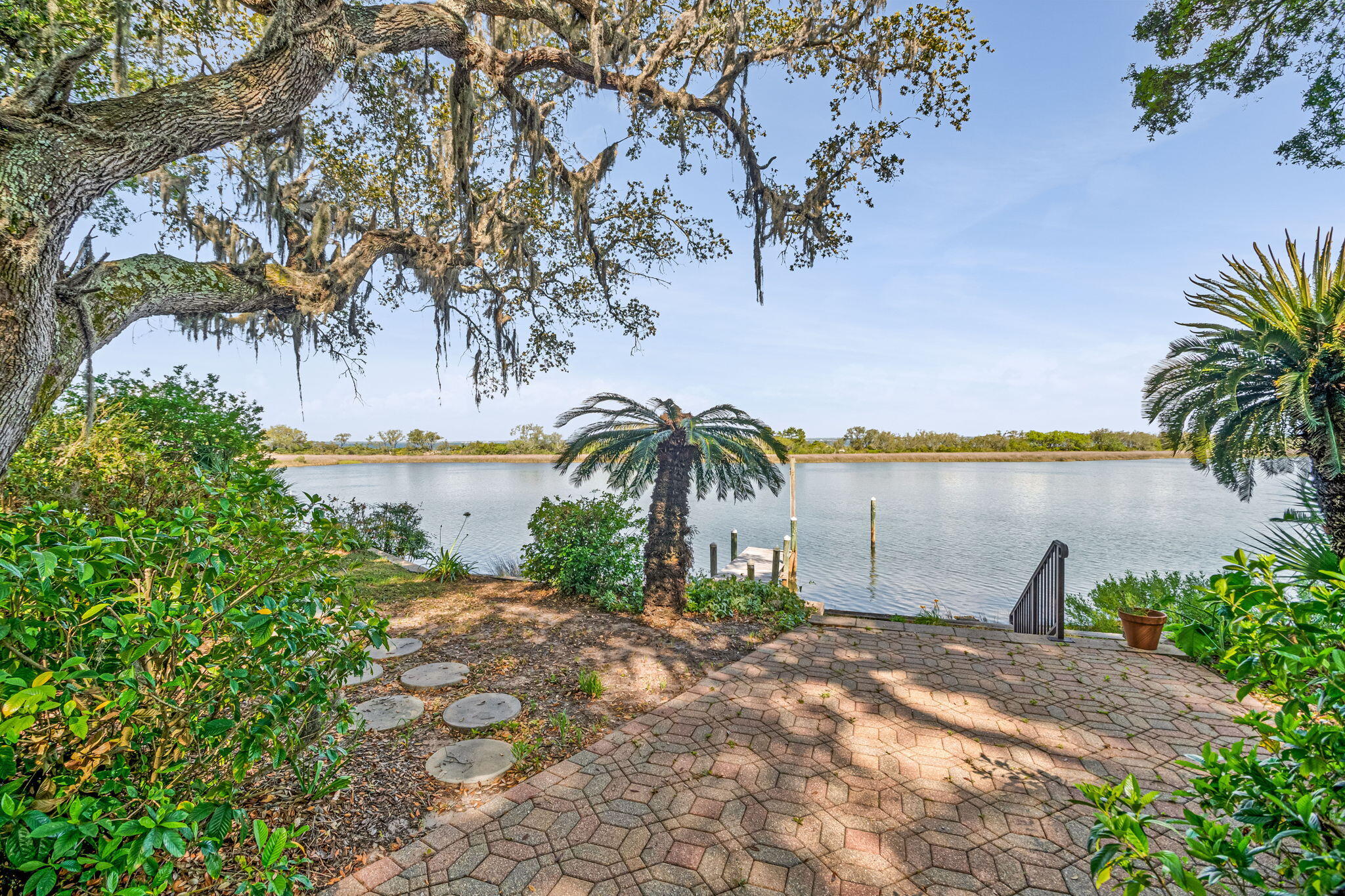 Show moreShow lessWaterfront Views | Downtown Skyline | Bay Bridge
Experience elevated coastal living in this contemporary Gulf Breeze home featuring panoramic bay views, a striking downtown skyline backdrop, and direct views of the iconic bay bridge. Situated on a .437-acre lot, this property offers 3 bedrooms, 2.5 baths, plus an office with a closet that can function as a fourth bedroom. The home was taken down to the slab and fully renovated, with a design focused on maximizing natural light and capturing water views from multiple living spaces.
Inside, floor-to-ceiling windows facing the bay fill the home with natural light, complementing vaulted ceilings and an open layout. The interior offers a blend of modern finishes and functional design, suitable for both everyday living. Show moreShow lessWaterfront Views | Downtown Skyline | Bay Bridge
Experience elevated coastal living in this contemporary Gulf Breeze home featuring panoramic bay views, a striking downtown skyline backdrop, and direct views of the iconic bay bridge. Situated on a .437-acre lot, this property offers 3 bedrooms, 2.5 baths, plus an office with a closet that can function as a fourth bedroom. The home was taken down to the slab and fully renovated, with a design focused on maximizing natural light and capturing water views from multiple living spaces.
Inside, floor-to-ceiling windows facing the bay fill the home with natural light, complementing vaulted ceilings and an open layout. The interior offers a blend of modern finishes and functional design, suitable for both everyday living and entertaining. The lot provides space for a potential pool, with a rendering available in the photos for reference.
The property offers convenient access to the Intracoastal Waterway and the ability to reach area beaches by boat, supporting a variety of waterfront and recreational activities. Located in a golf cart-friendly community, the neighborhood features a relaxed coastal setting. Convenient to beaches, shopping, dining, and downtown Pensacola.