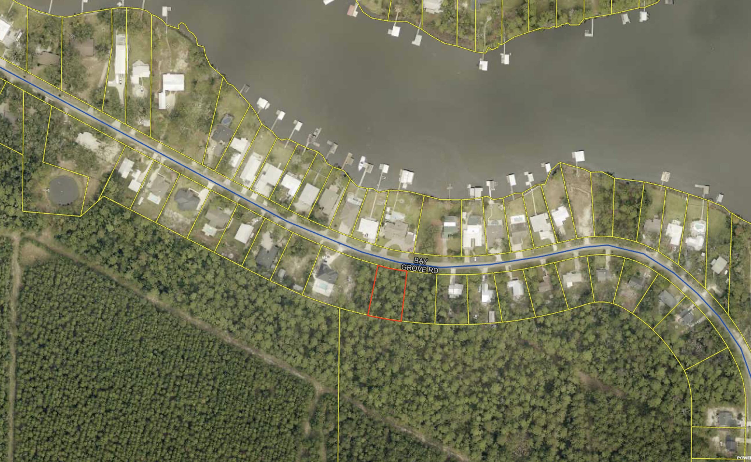 BUILDING PLANS AVAILABLE! Very nice lot in Bay Grove/Mallet Bayou area. Very few lots left in this popular Freeport neighborhood. Lot, located just across the street from the water is entirely in flood zone ''X''. Close to Hwy 331, 30A, new park and boat ramp. No HOA. Interior lots in this neighborhood very rarely come available. Great opportunity! Boundary survey available (2011). (Please verify any important details, information taken from public records.) There is no HOA so there are no fees.