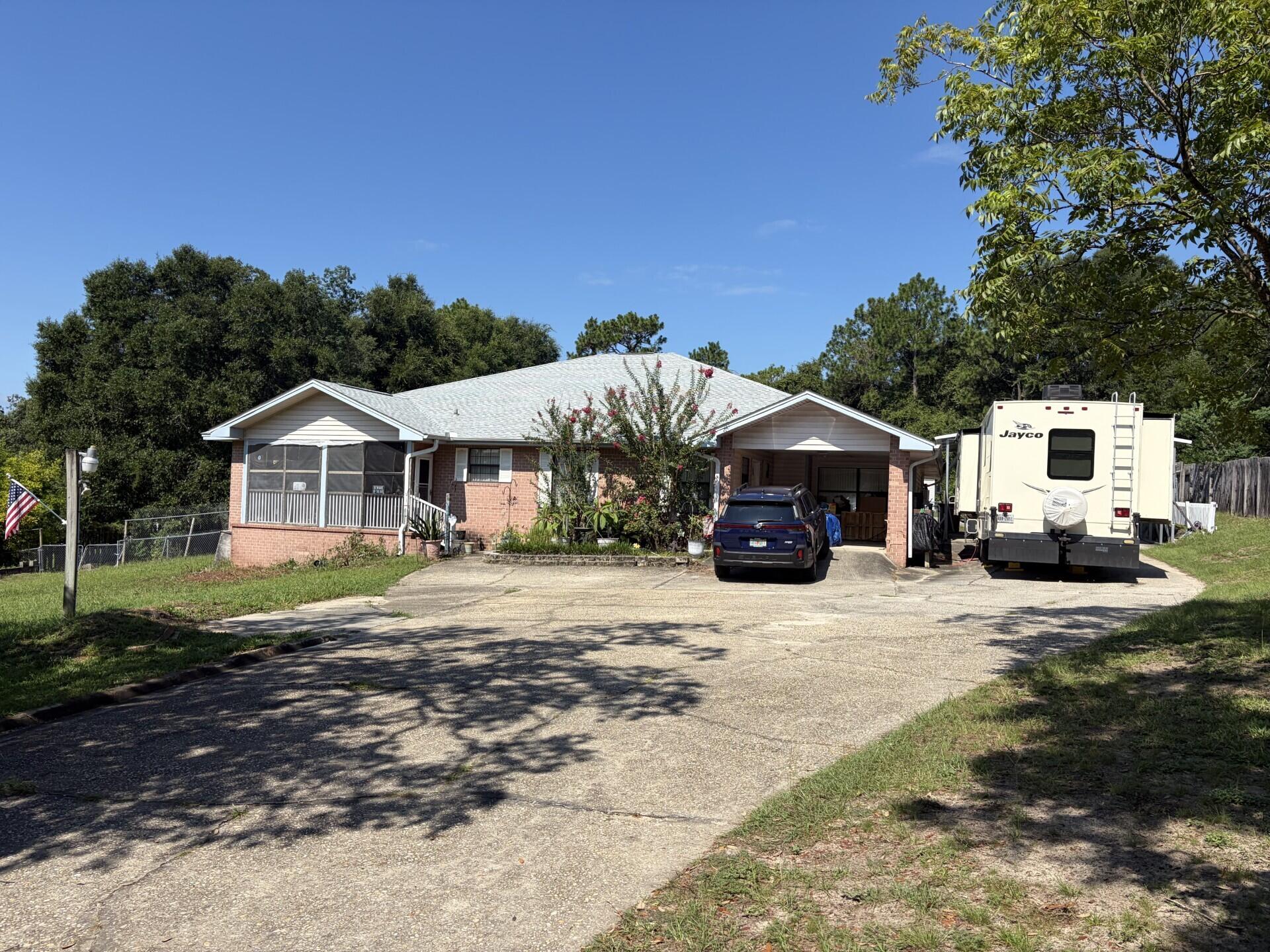 Open House Saturday 9/5/26 12pm-3pm. Looking for a little more room to live, work and enjoy the country life? Newer roof September 2024. Imagine coming home to a spacious 1 acre homestead where you room for your equipment, gardening tools, hobbies, projects, and all the things that simply don't fit in a typical neighborhood. This 4 bedroom, 3 bath offers over 3,000.00 square feet of living space, along with inviting front and back porches where you can relax and enjoy the peaceful country setting. But the real bonus is the detached workshop and garage space. Whether you have machinery, lawn-care equipment, tools, paint equipment or just need pleny of extra room for RV, boat, or your projects and storage, this property offers the space you've been looking for. The spacious homestead is being offered AS IS, and the seller is ready to move forward with their retirement plans and would love to see all offers. This could be the opportunity you've been looking for with room to work and room to store all you things. Newer roof from 2024.